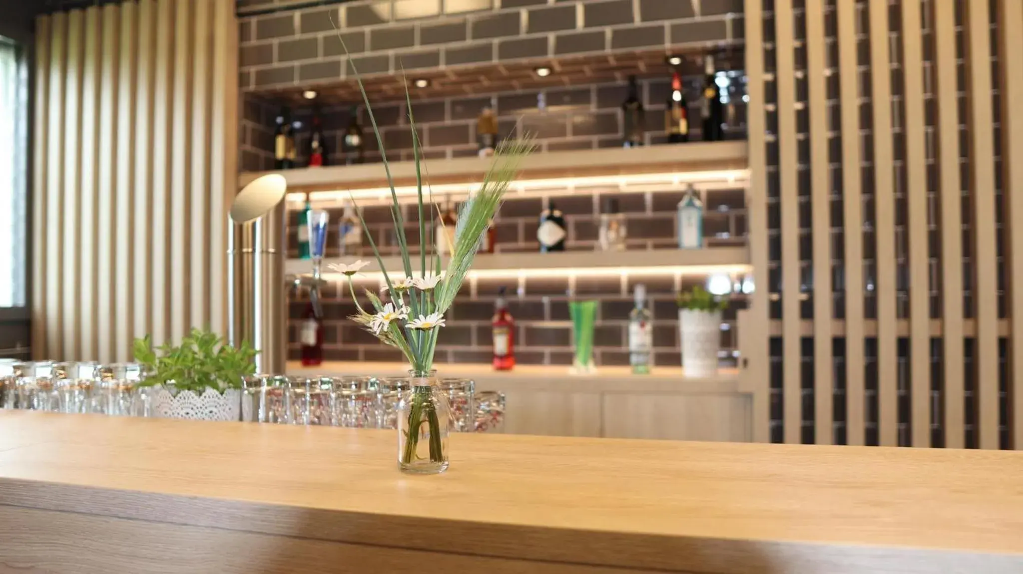 Lounge or bar in Holiday Inn Express Luzern-Neuenkirch by IHG Lounge or bar in Holiday Inn Express Luzern-Neuenkirch by IHG