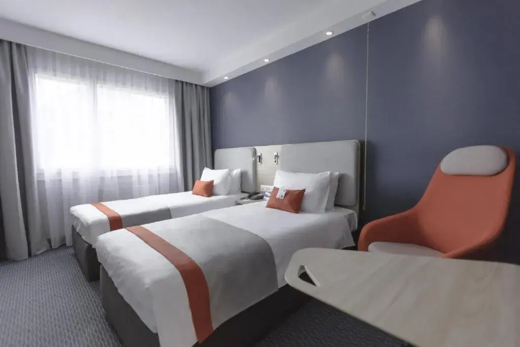 Bedroom, Bed in Holiday Inn Express Luzern-Neuenkirch by IHG Bedroom, Bed in Holiday Inn Express Luzern-Neuenkirch by IHG