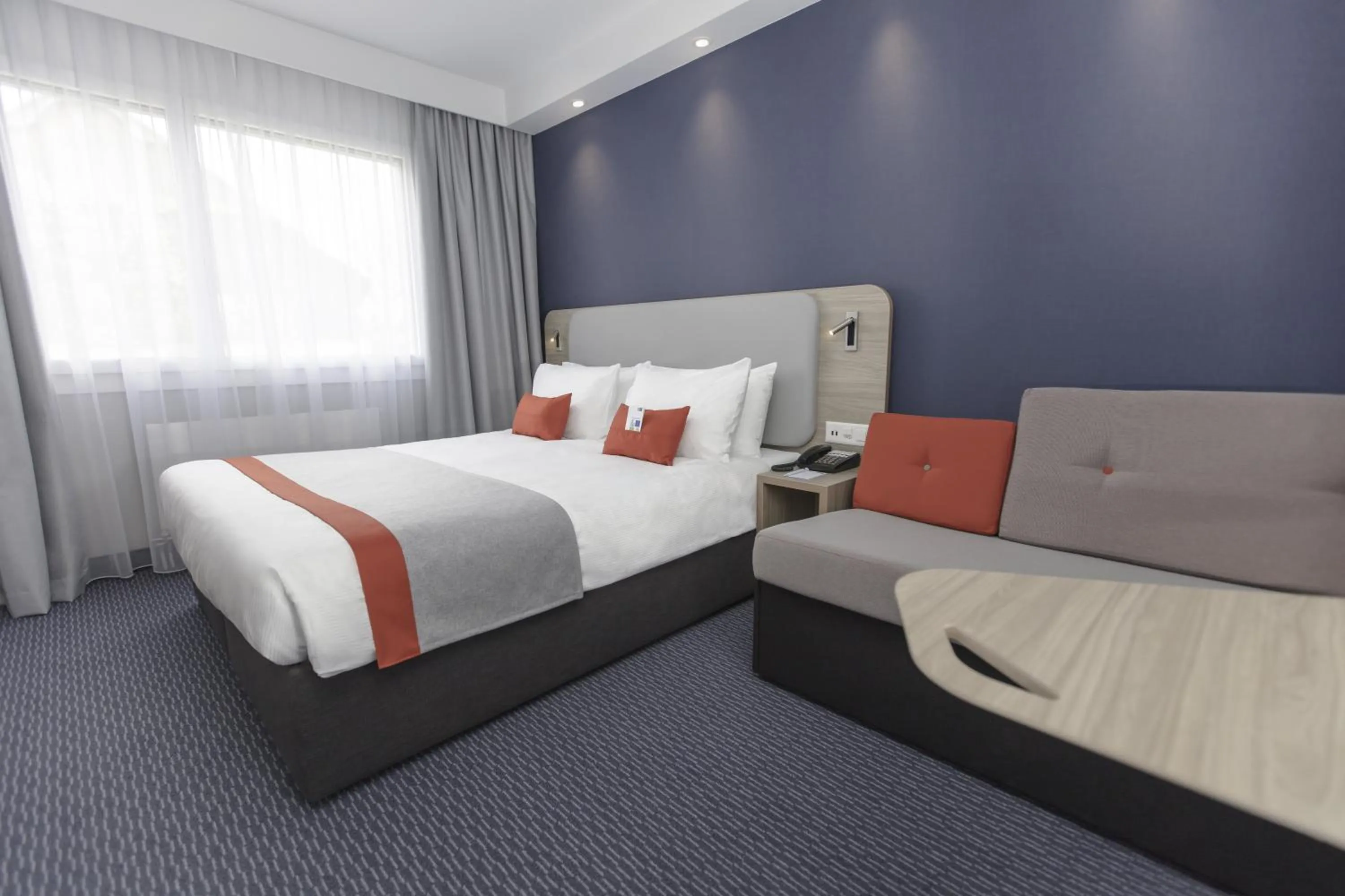 Photo of the whole room, Bed in Holiday Inn Express Luzern-Neuenkirch by IHG