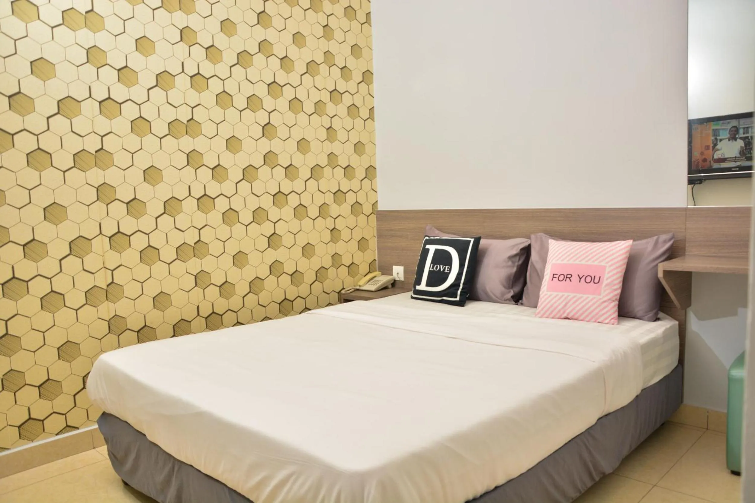 Bed in DUTA HOTEL