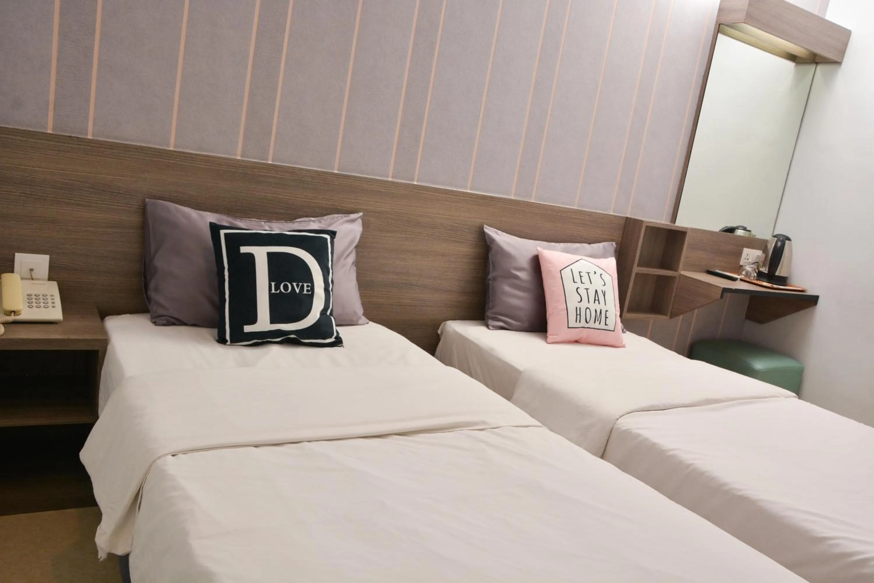 Bed in DUTA HOTEL