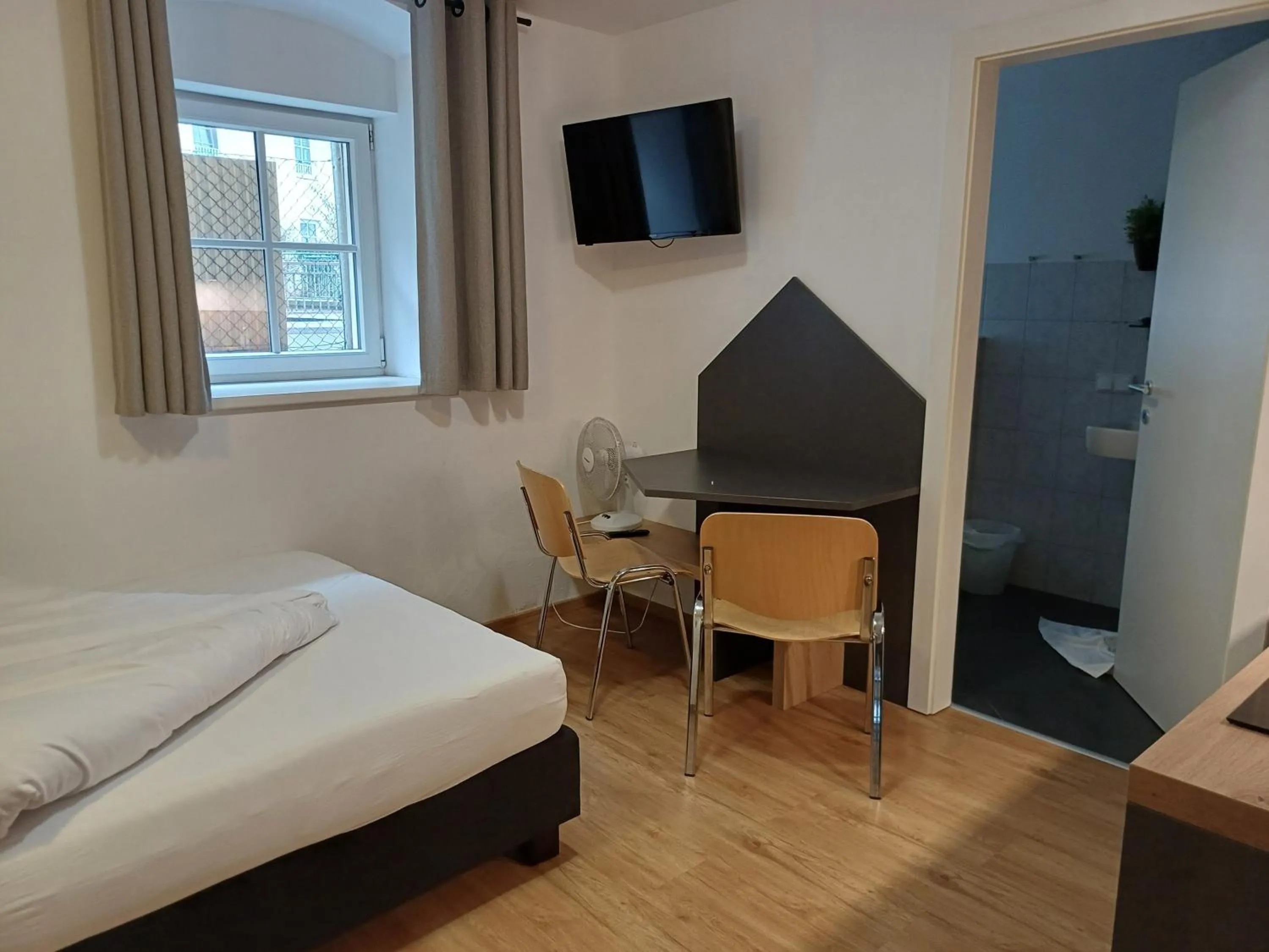 Seating area, Bed in Apartments Ante Portas