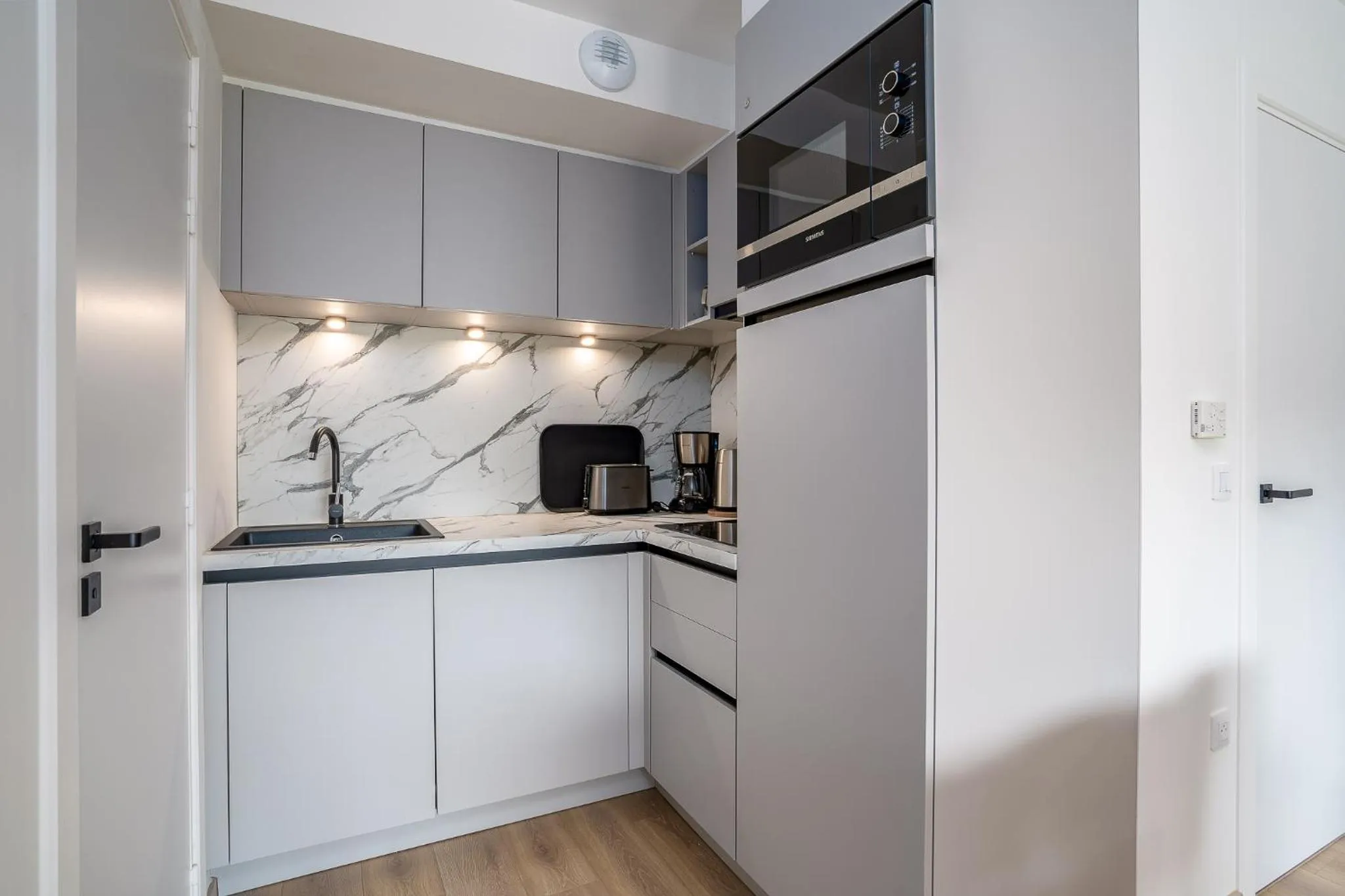 Kitchen or kitchenette in Evancy Trésors d'Opale