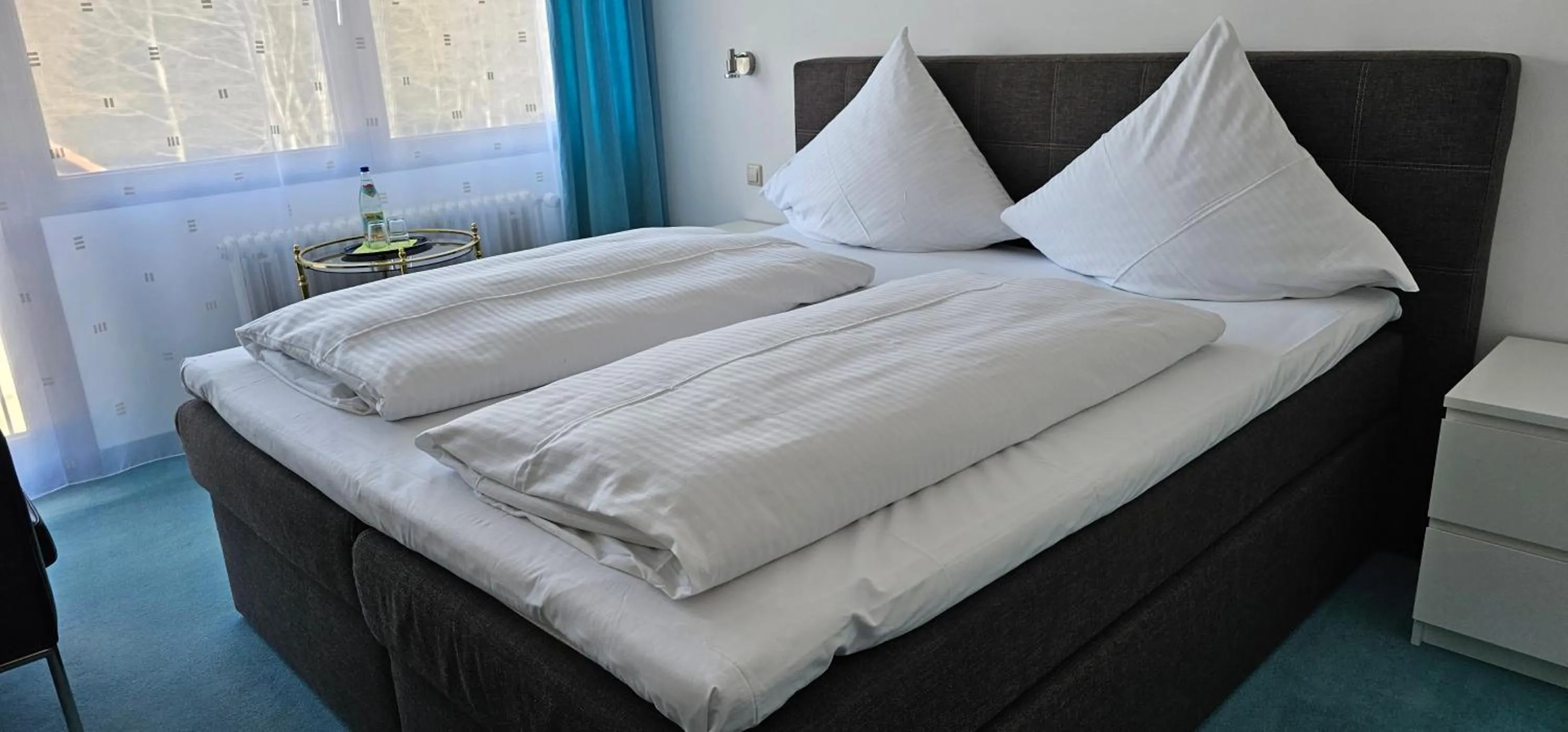 Photo of the whole room, Bed in Schwaben Resort Ebnisee