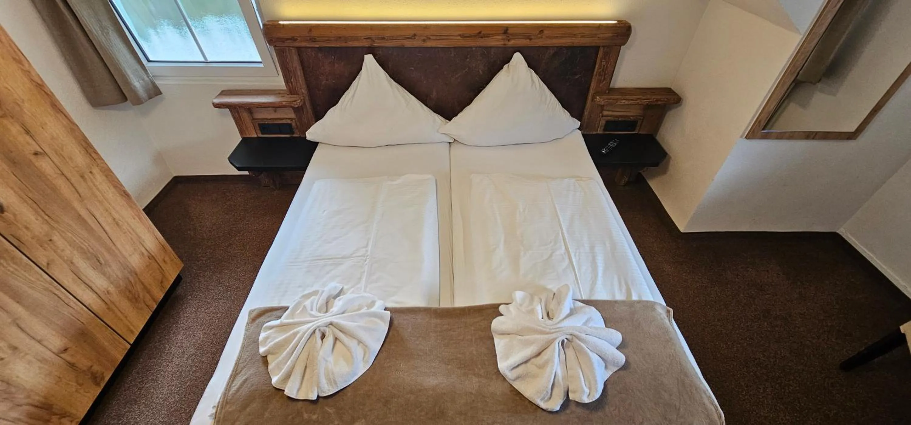 Photo of the whole room, Bed in Schwaben Resort Ebnisee