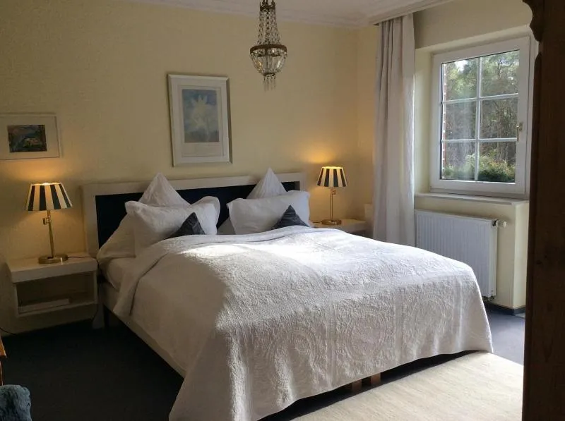 Bed in Das kleine Hotel am Park Garni