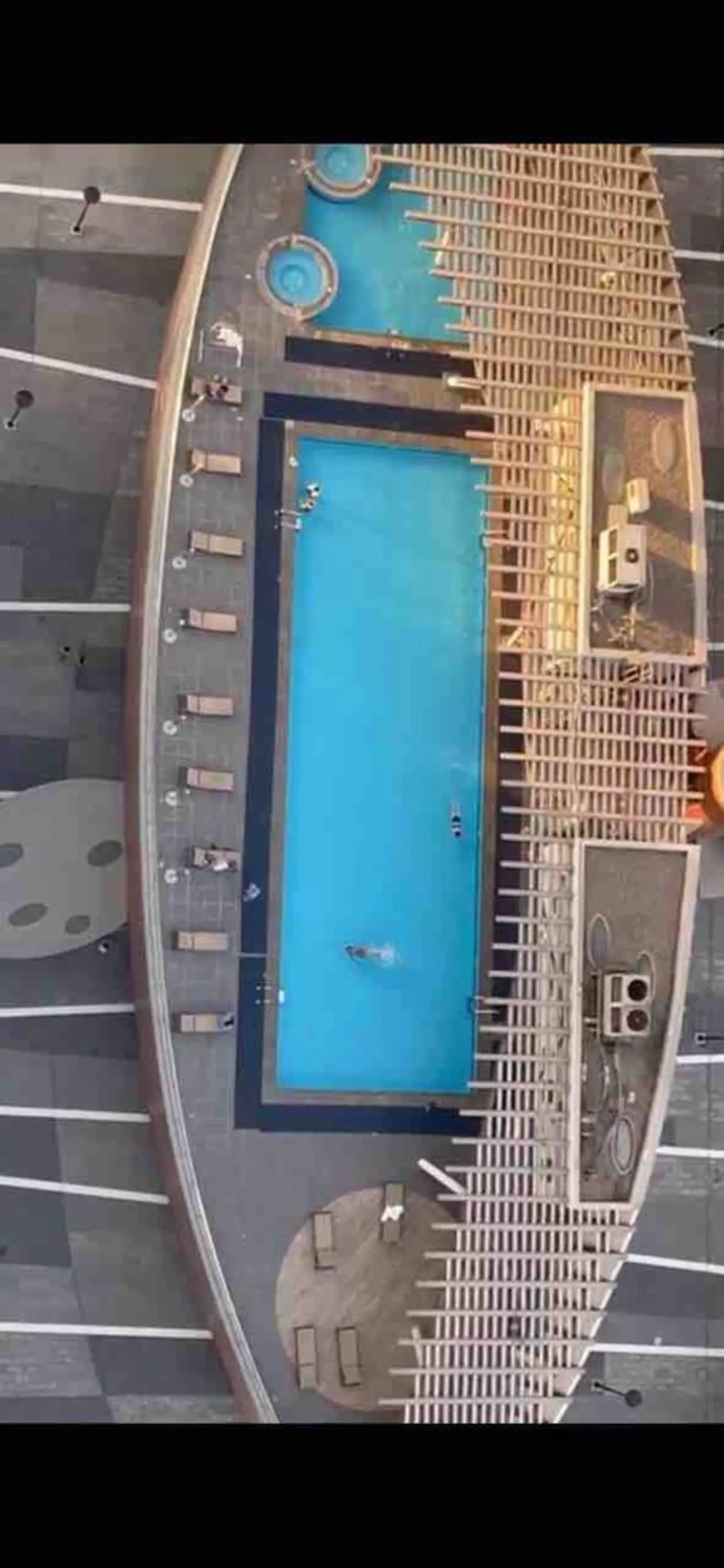 Swimming pool in Scenic 2 Bedroom Apartment - Downtown Business Bay