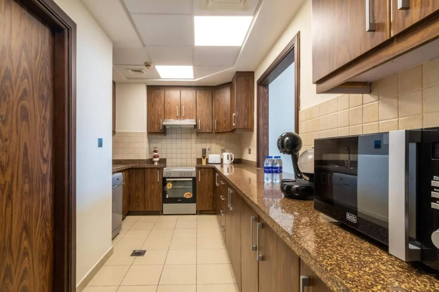 Kitchen or kitchenette in Scenic 2 Bedroom Apartment - Downtown Business Bay