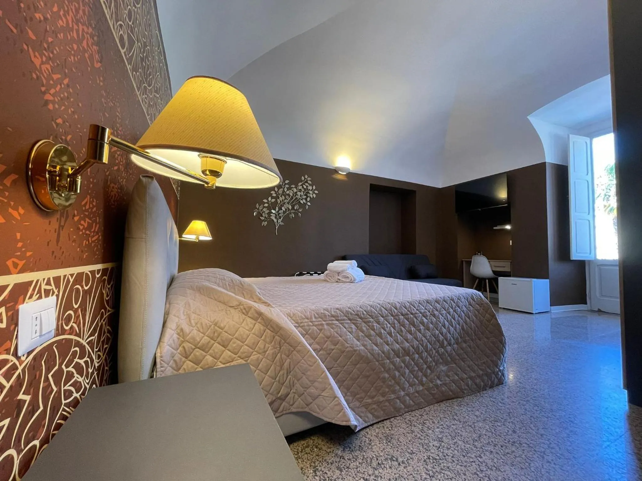 Bed in CconfortHotels Central Rooms