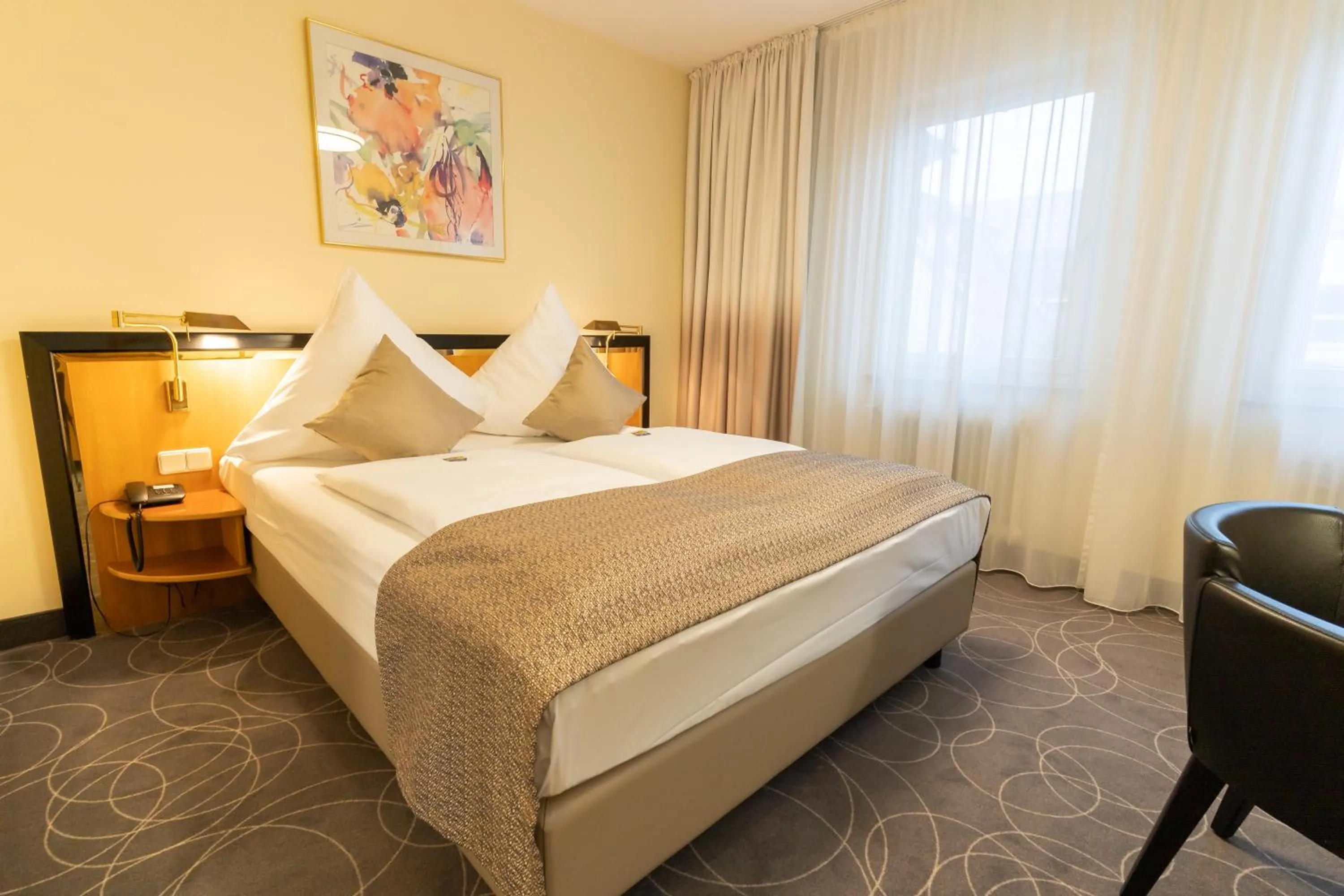 Bed in Hotel am Stadtgarten