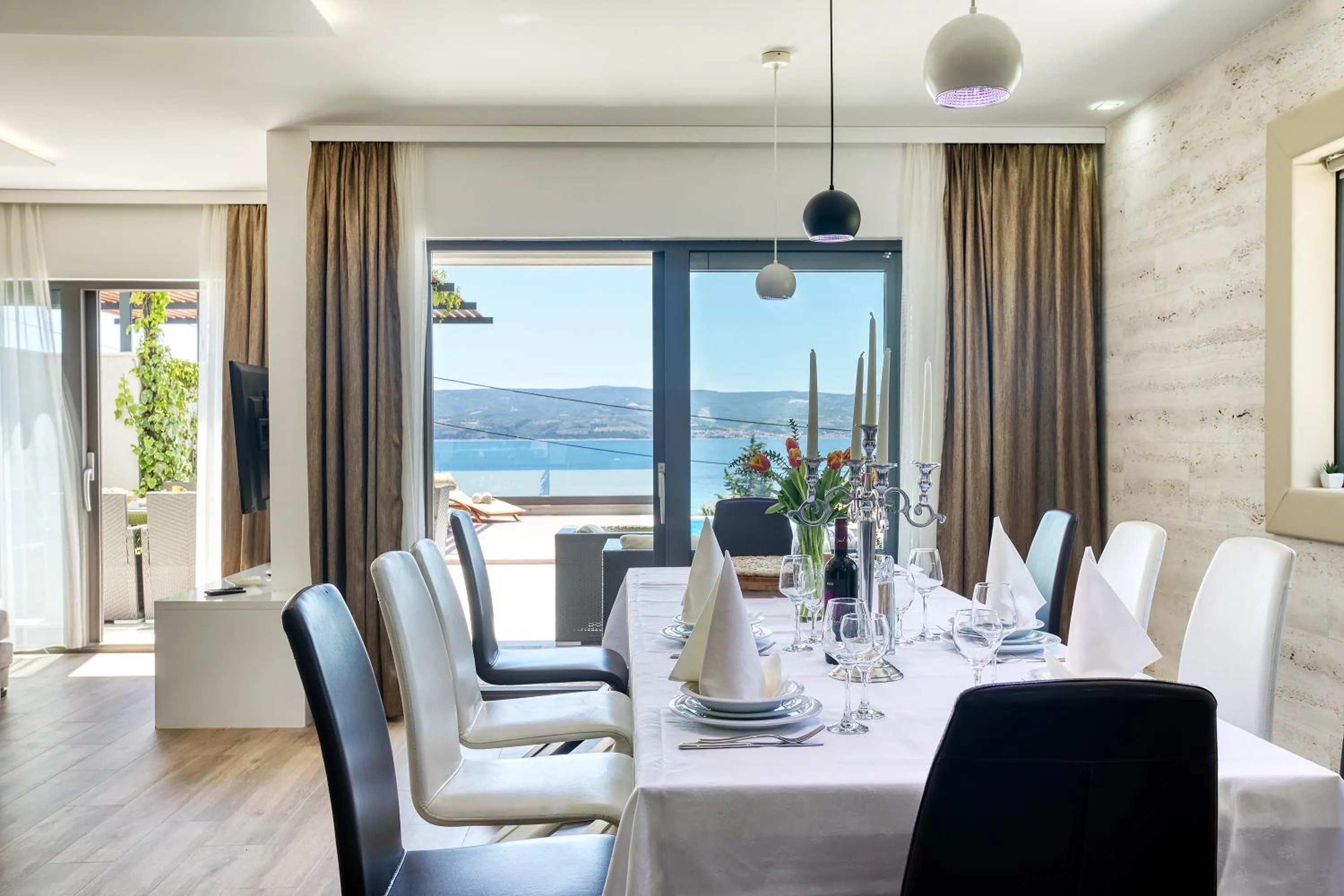 Dining area in LUXURY VILLA PARADISE 120m from sandy beach, heated pool, billiard, max 12 pax