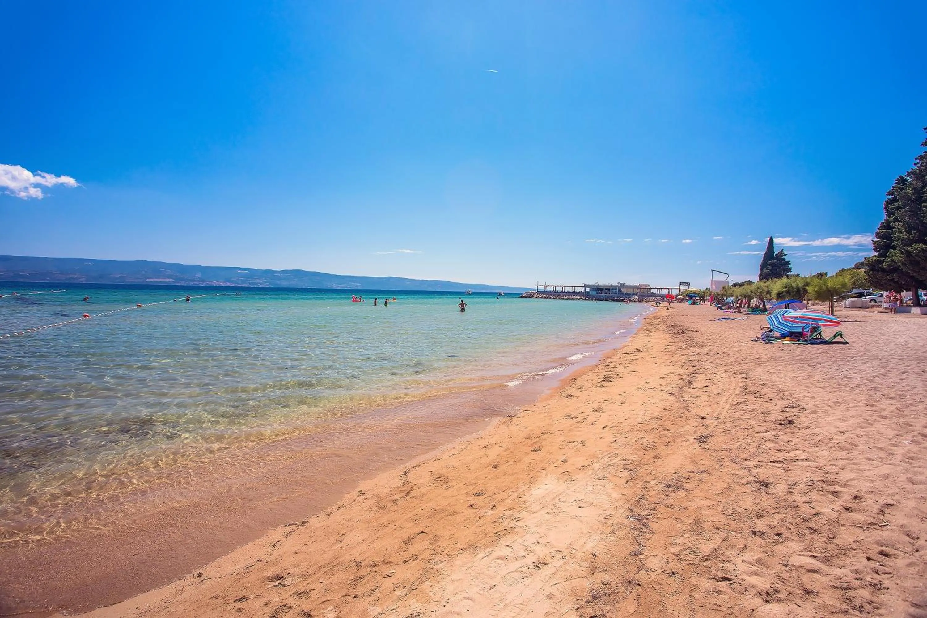 Beach in LUXURY VILLA PARADISE 120m from sandy beach, heated pool, billiard, max 12 pax