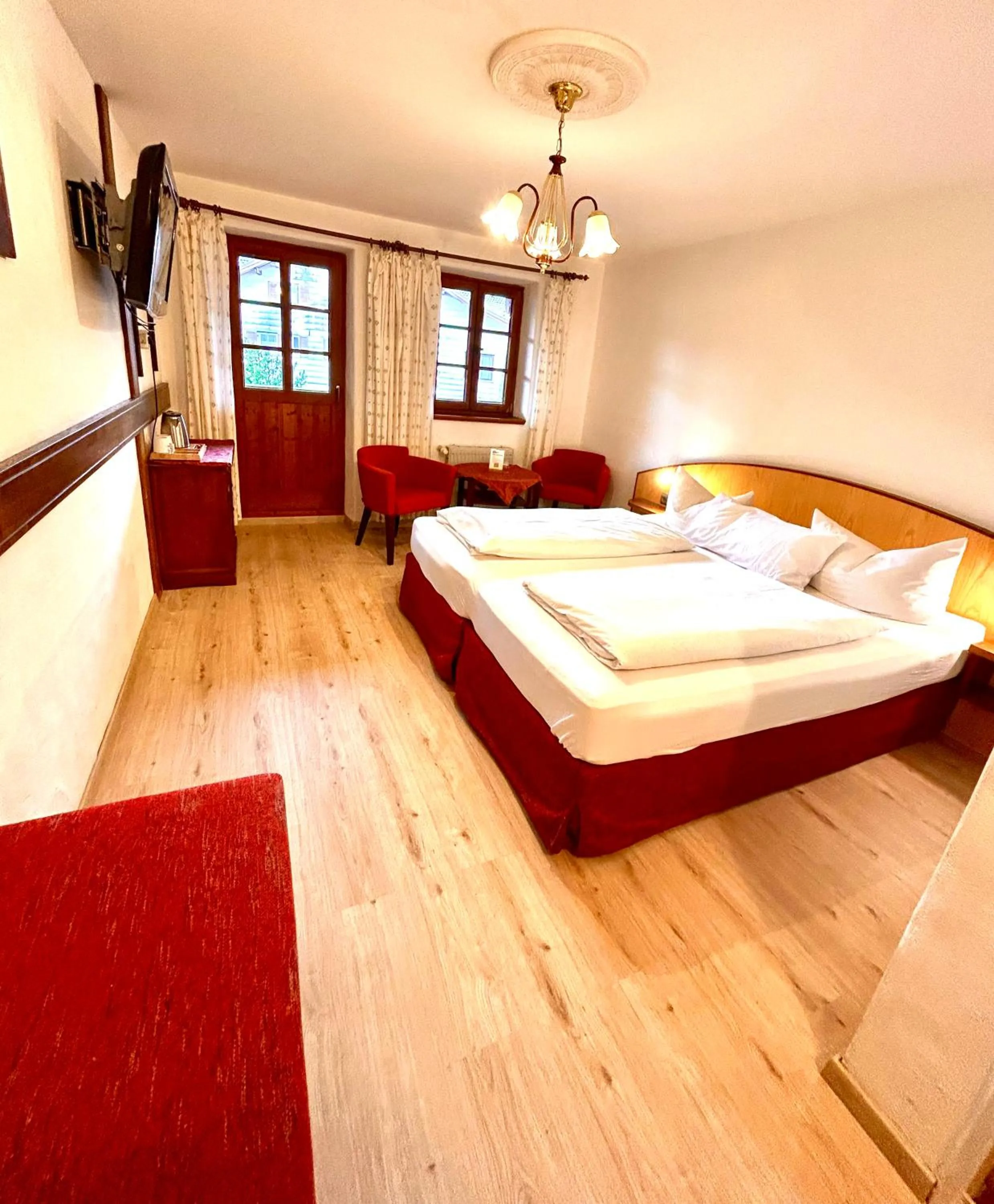 Photo of the whole room, Bed in Landhotel Huberhof