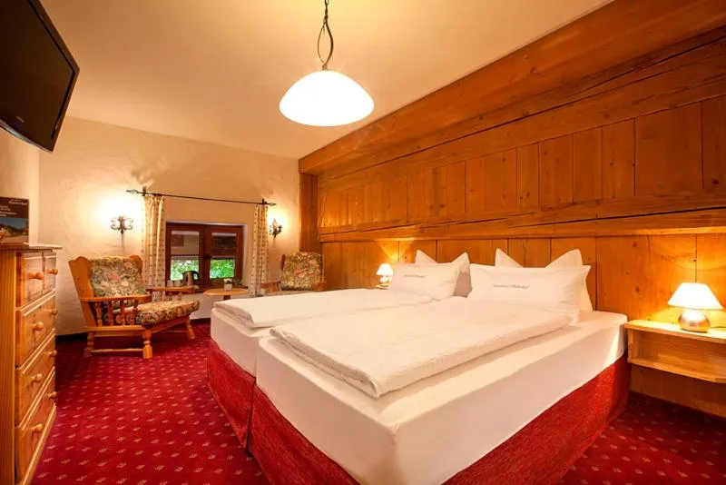 Photo of the whole room, Bed in Landhotel Huberhof