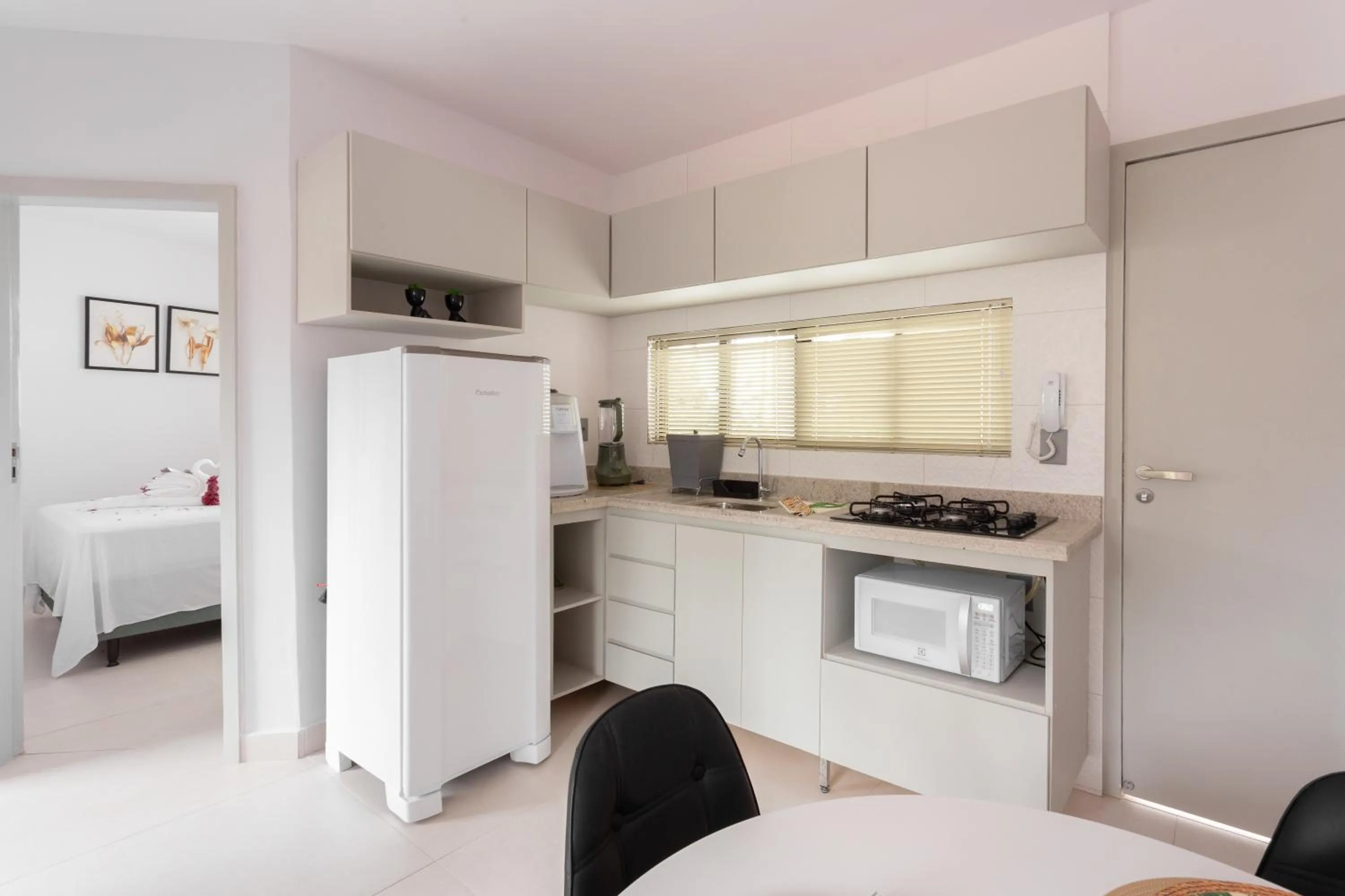Communal kitchen in Quinta do Mar Flats Porto de Galinhas