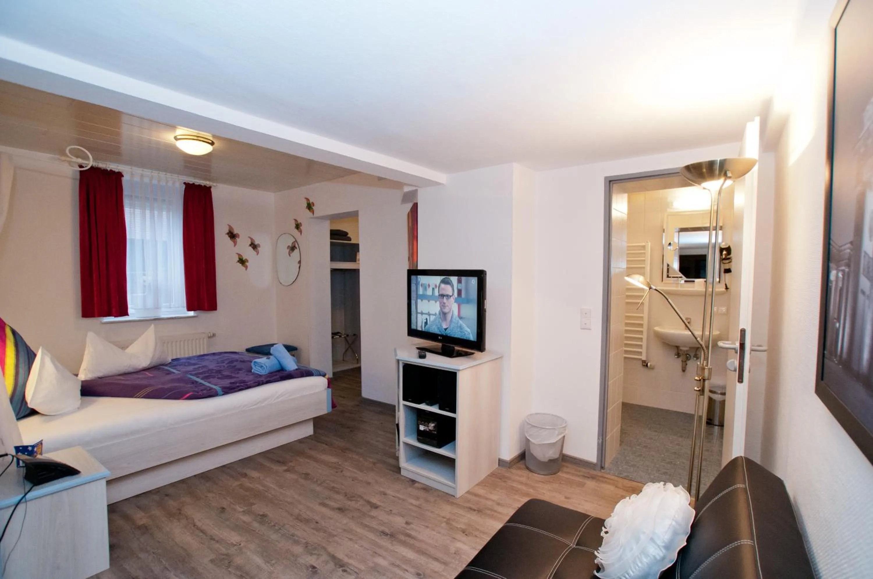 Photo of the whole room, Bed in Landgasthaus Bonn