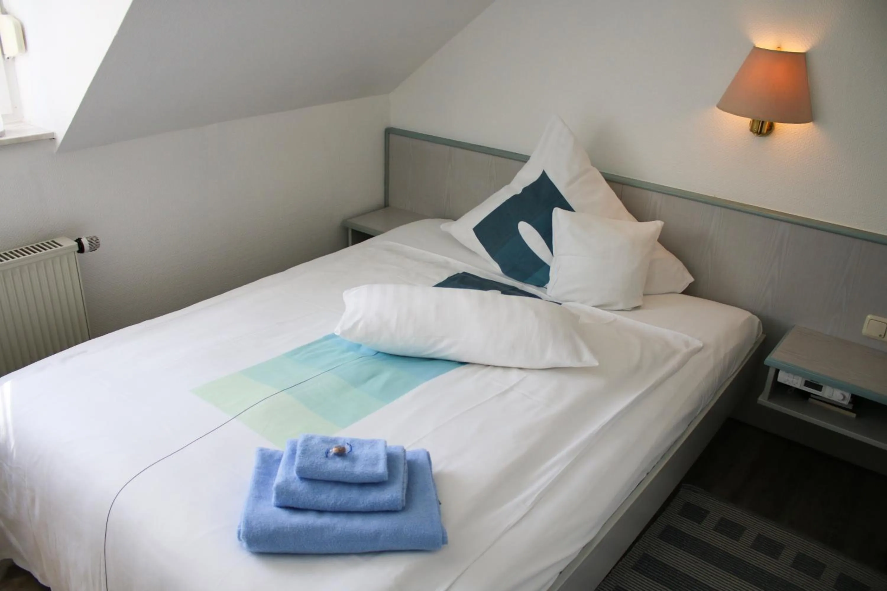 Photo of the whole room, Bed in Landgasthaus Bonn