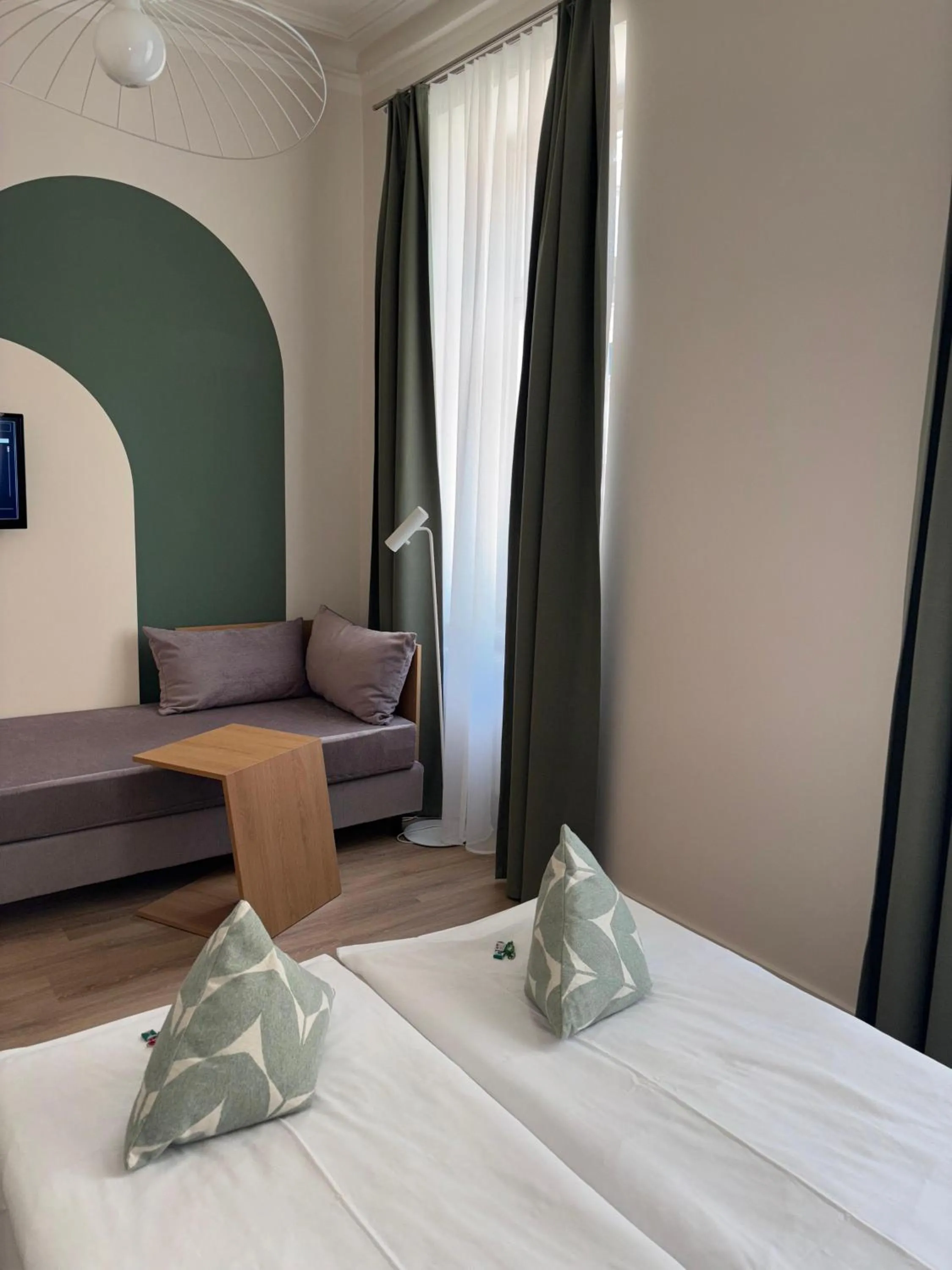 Bed in Gästehaus Centro in Konstanz