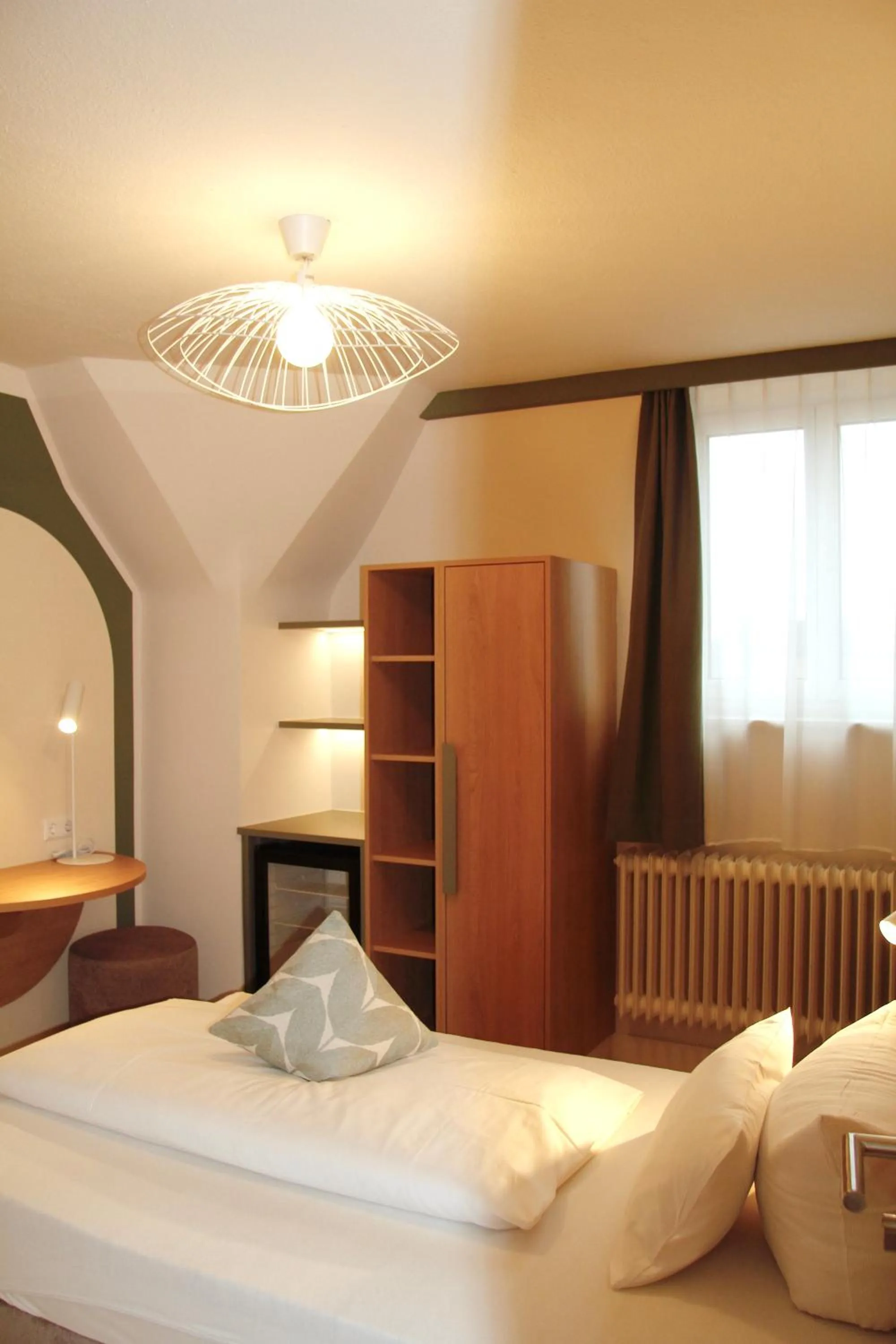 Bed in Gästehaus Centro in Konstanz