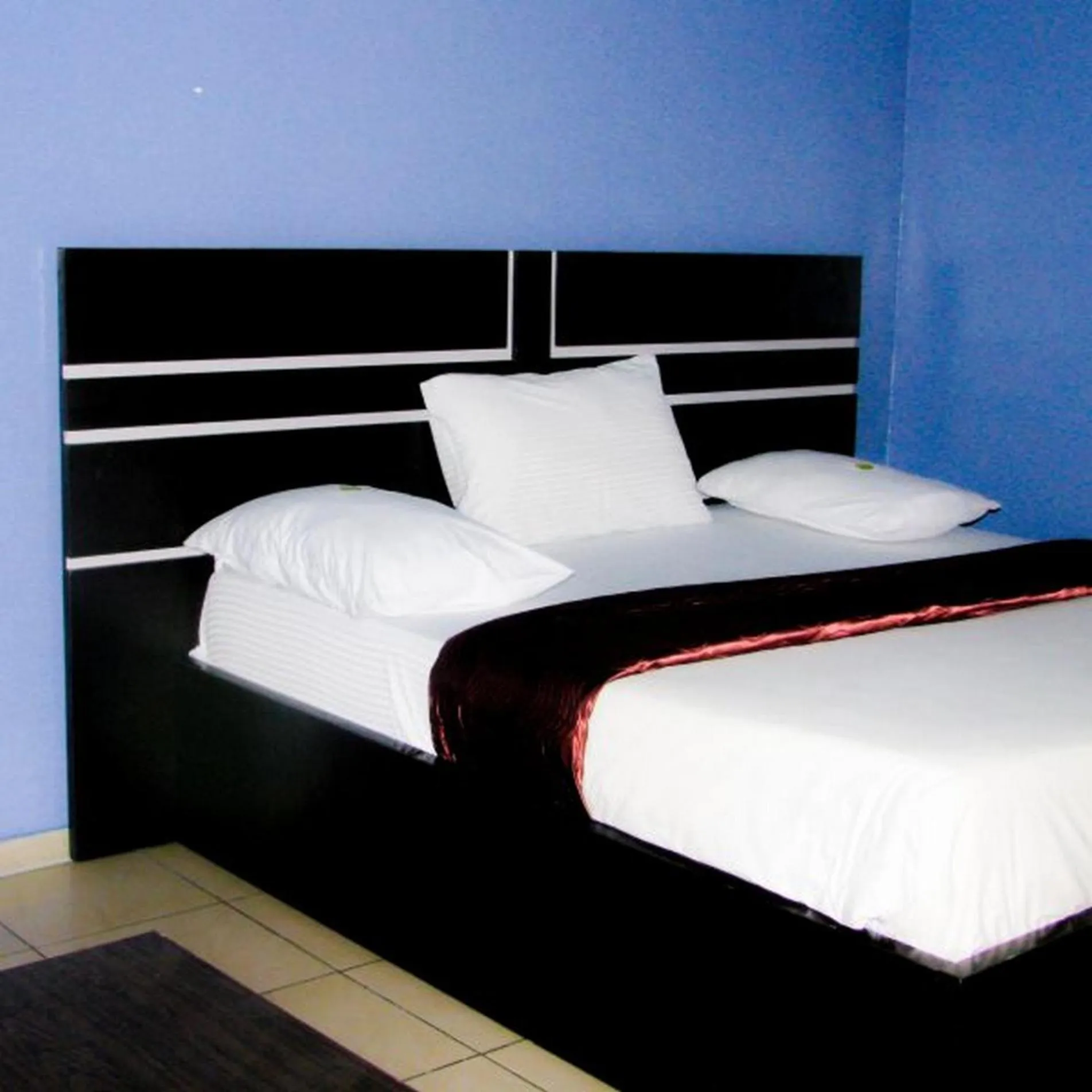 Bed in Londa Hotel and Suites - Double