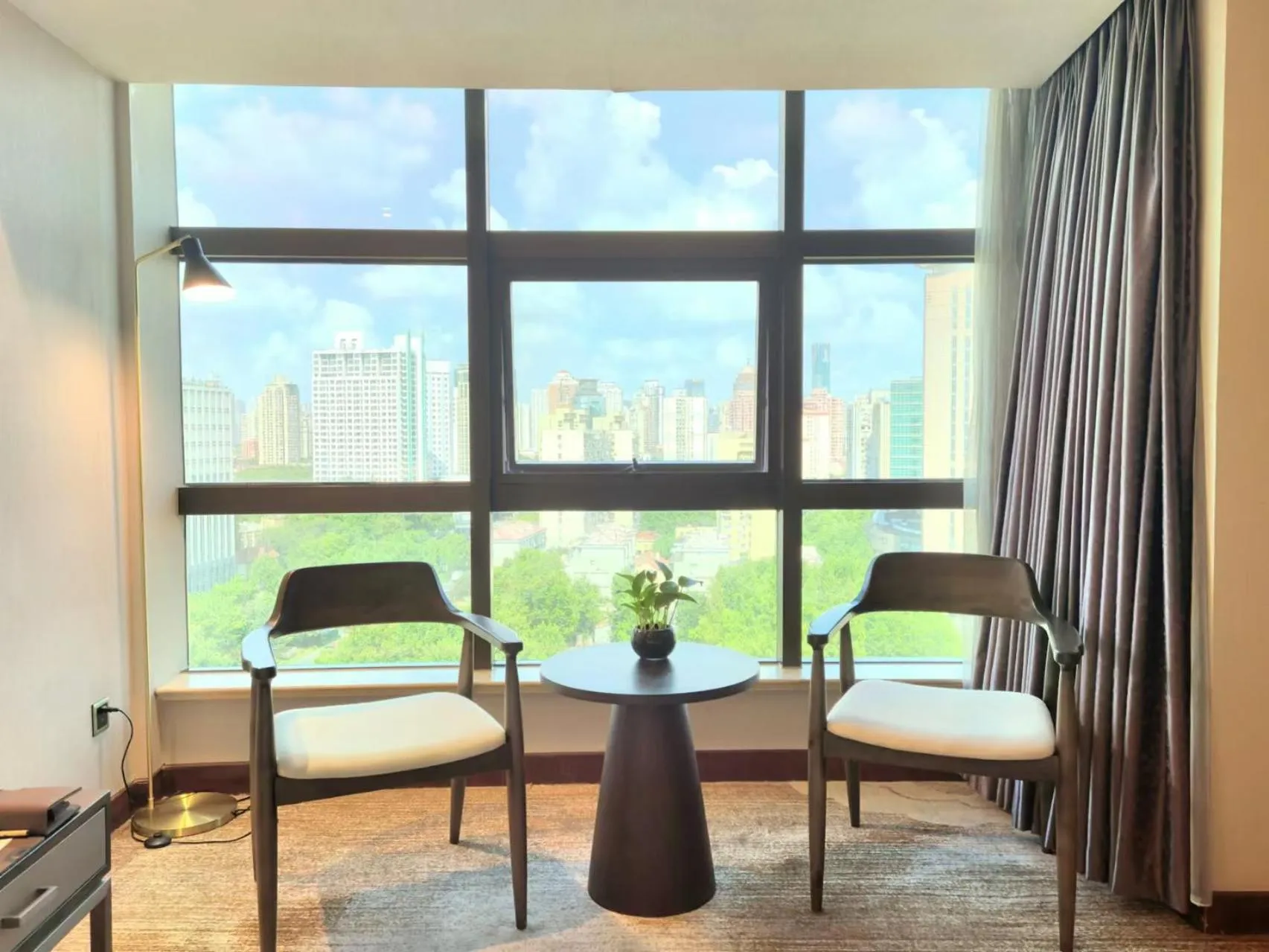 Seating area in Jin Jiang Pine City Hotel