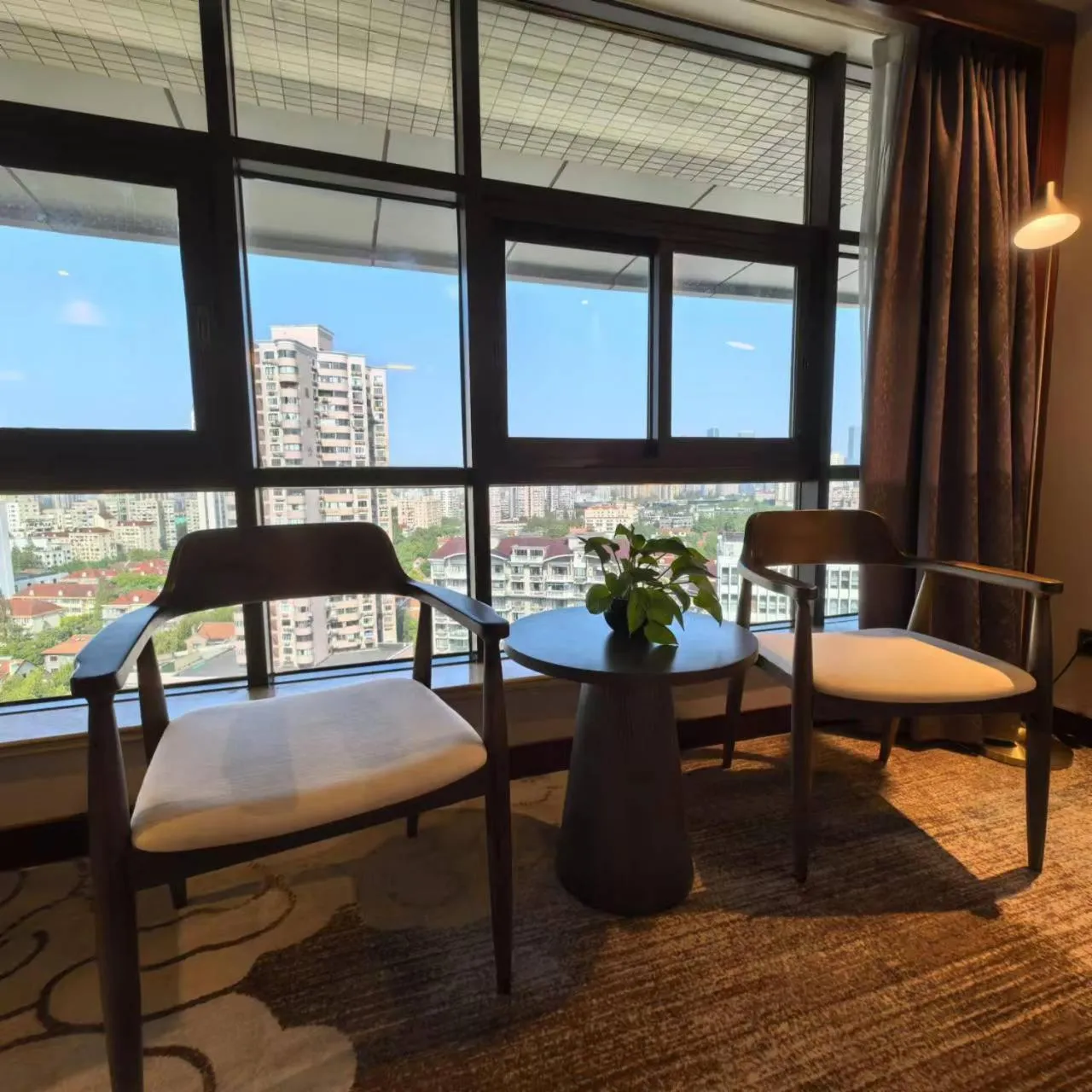 Seating area in Jin Jiang Pine City Hotel