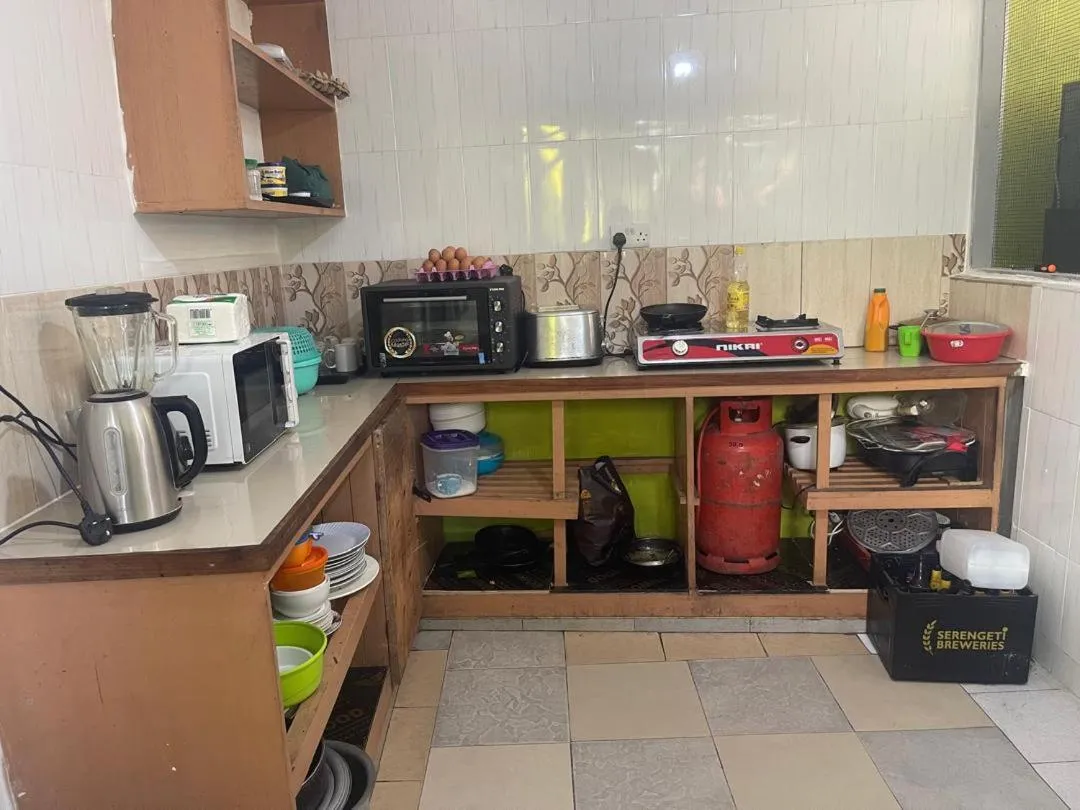 Kitchen or kitchenette in L&J Modern Backpackers Kinondoni