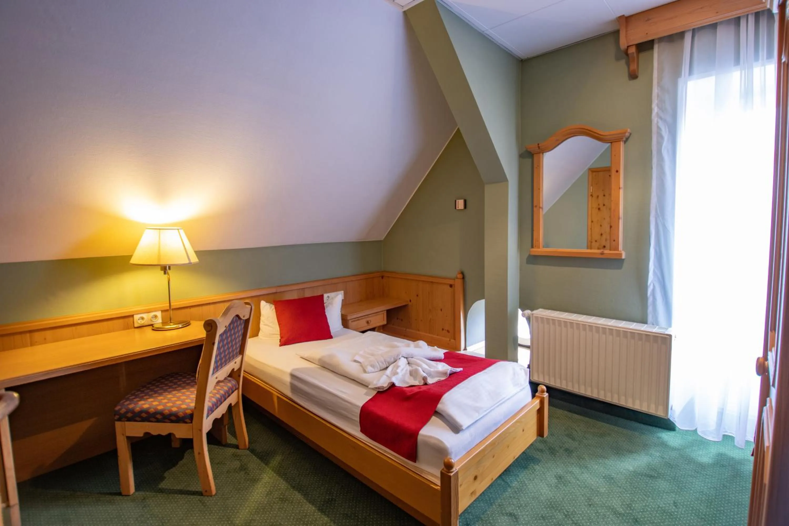 Photo of the whole room, Bed in Hotel Schloss Nebra