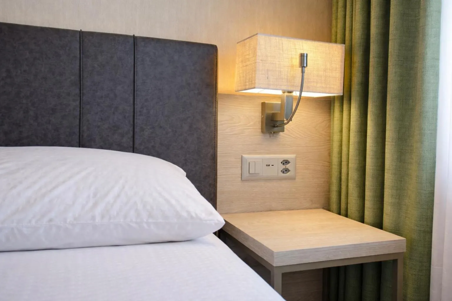 Bed in Hotel Nessi Locarno