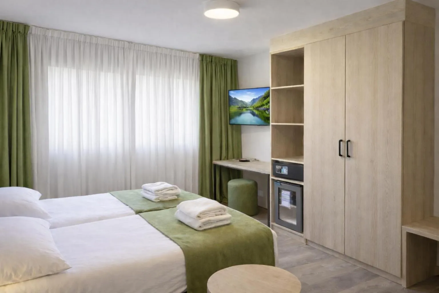 Bed in Hotel Nessi Locarno