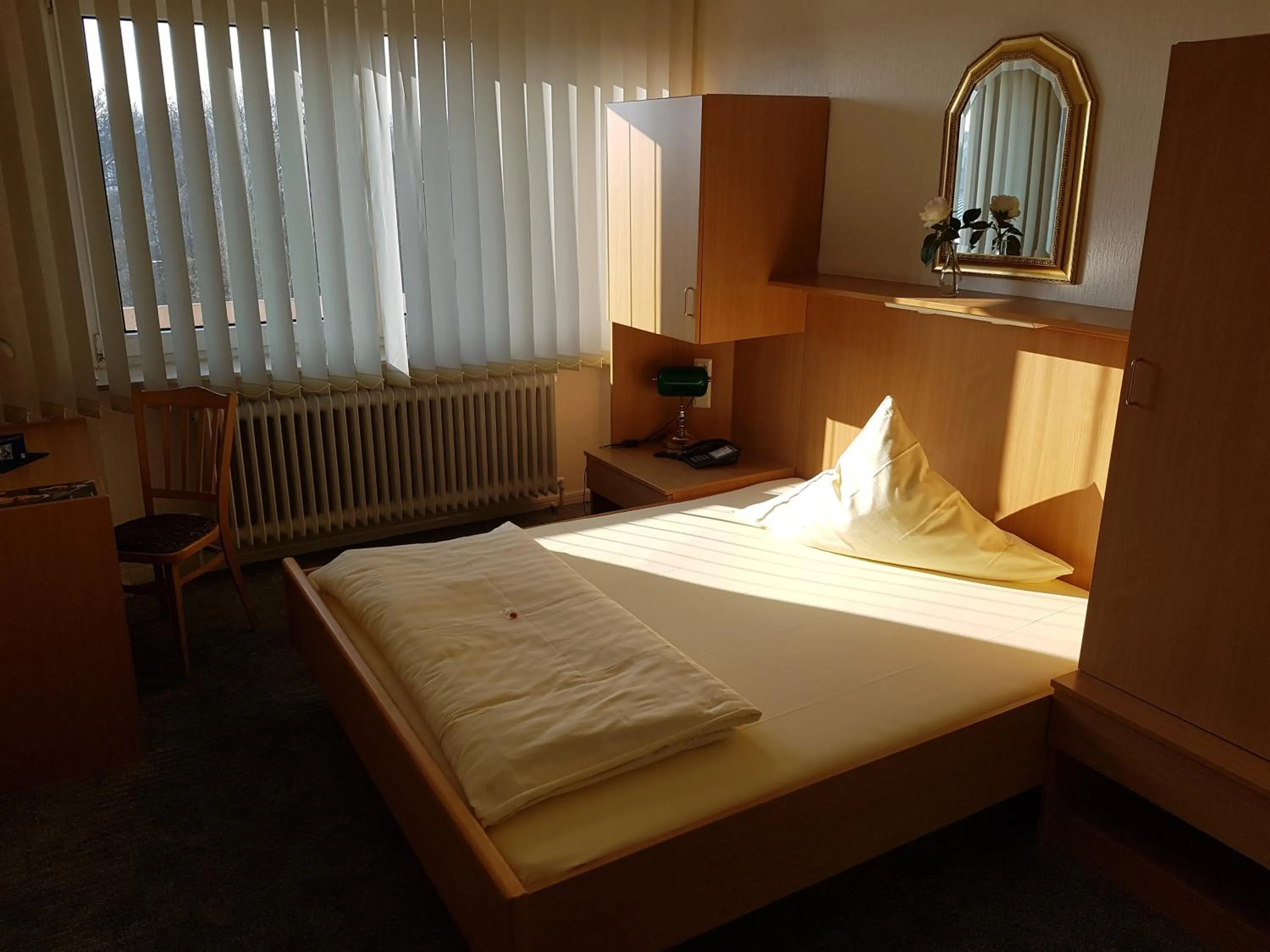 Photo of the whole room, Bed in Hotel Stadt Baunatal