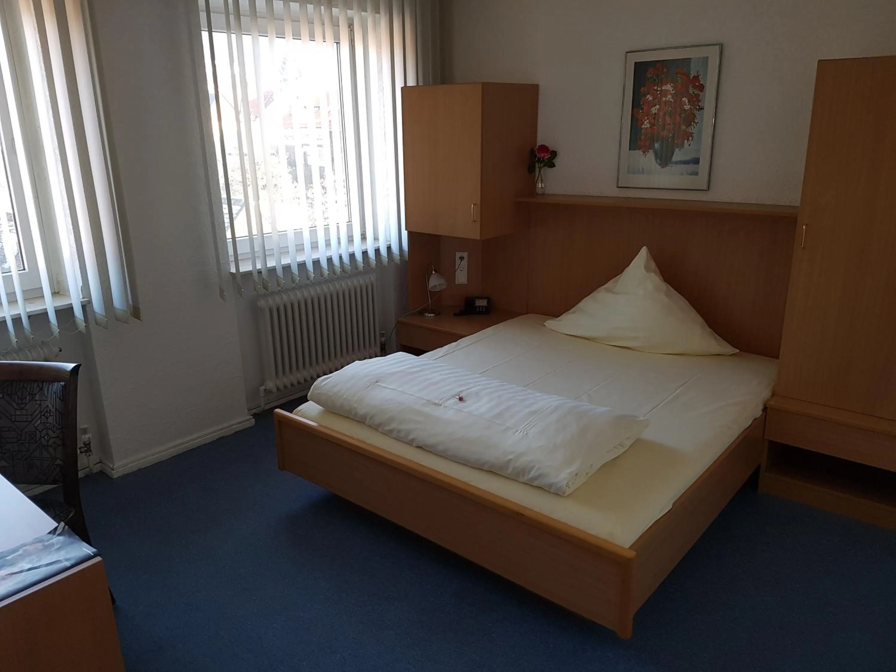 Photo of the whole room, Bed in Hotel Stadt Baunatal