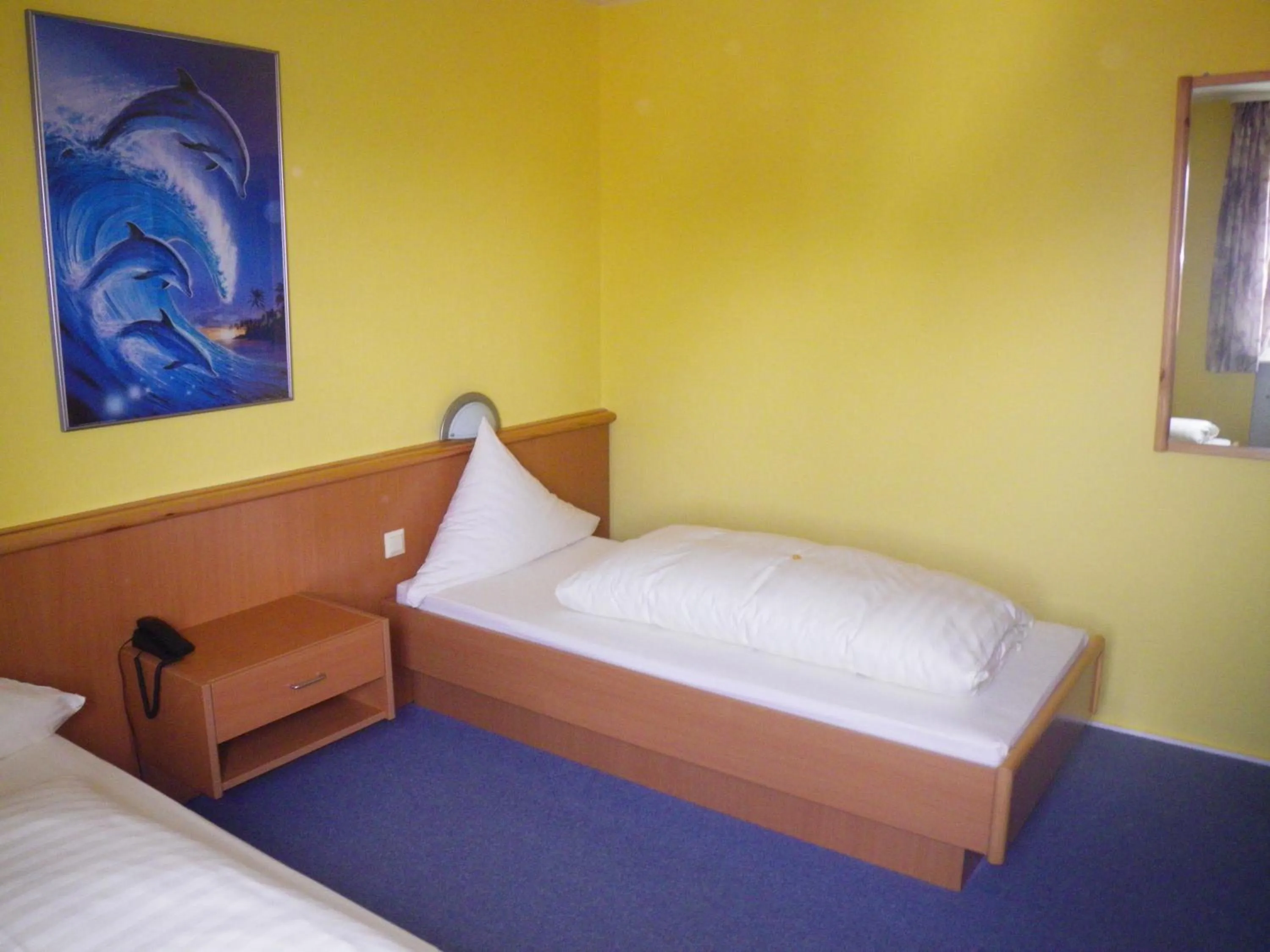 Decorative detail, Bed in Hotel Stadt Baunatal