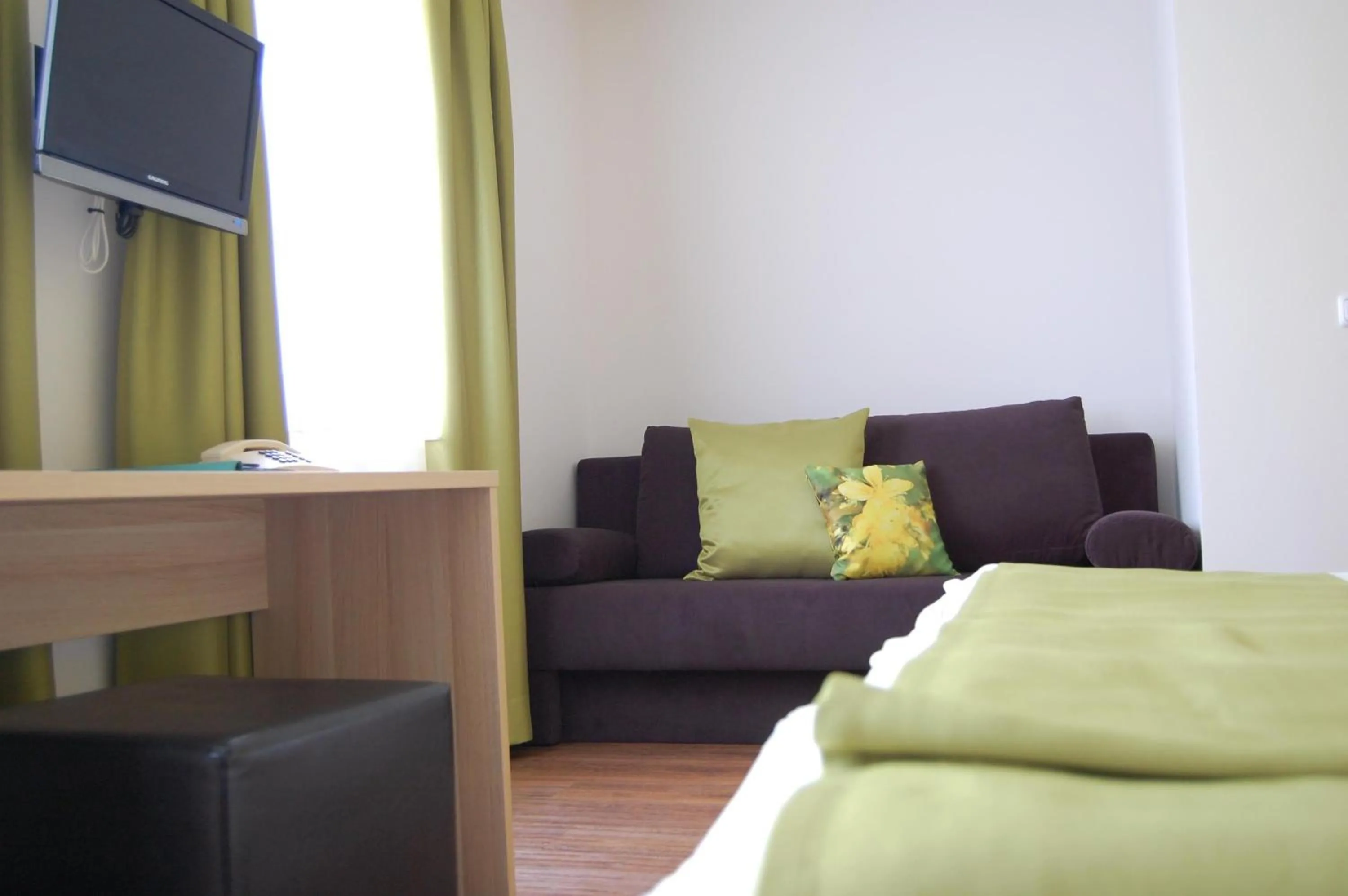 Seating area, Bed in Gasthof Linden & Wildkräuterhotel
