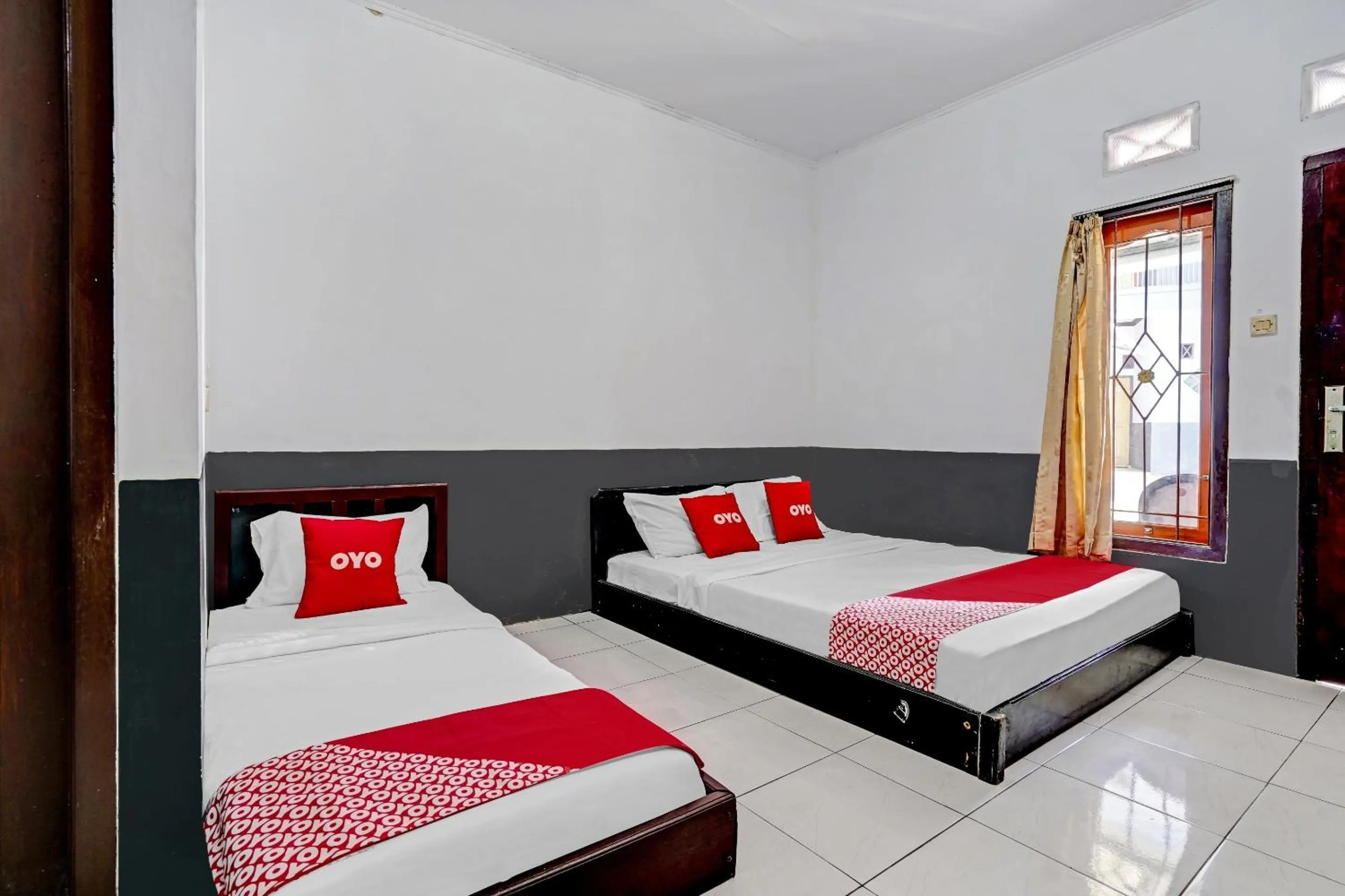 Bedroom in OYO 90405 Penginapan Sasti Kuningan