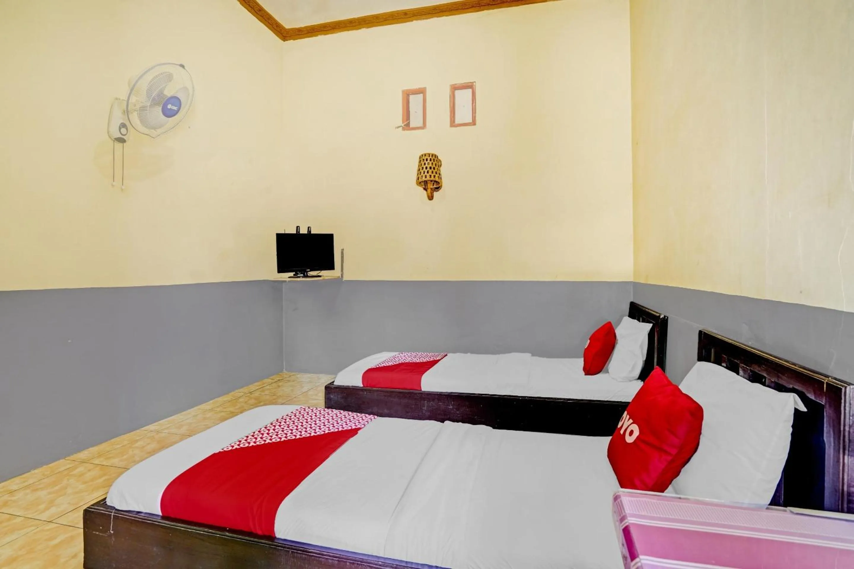 Bedroom in OYO 90405 Penginapan Sasti Kuningan
