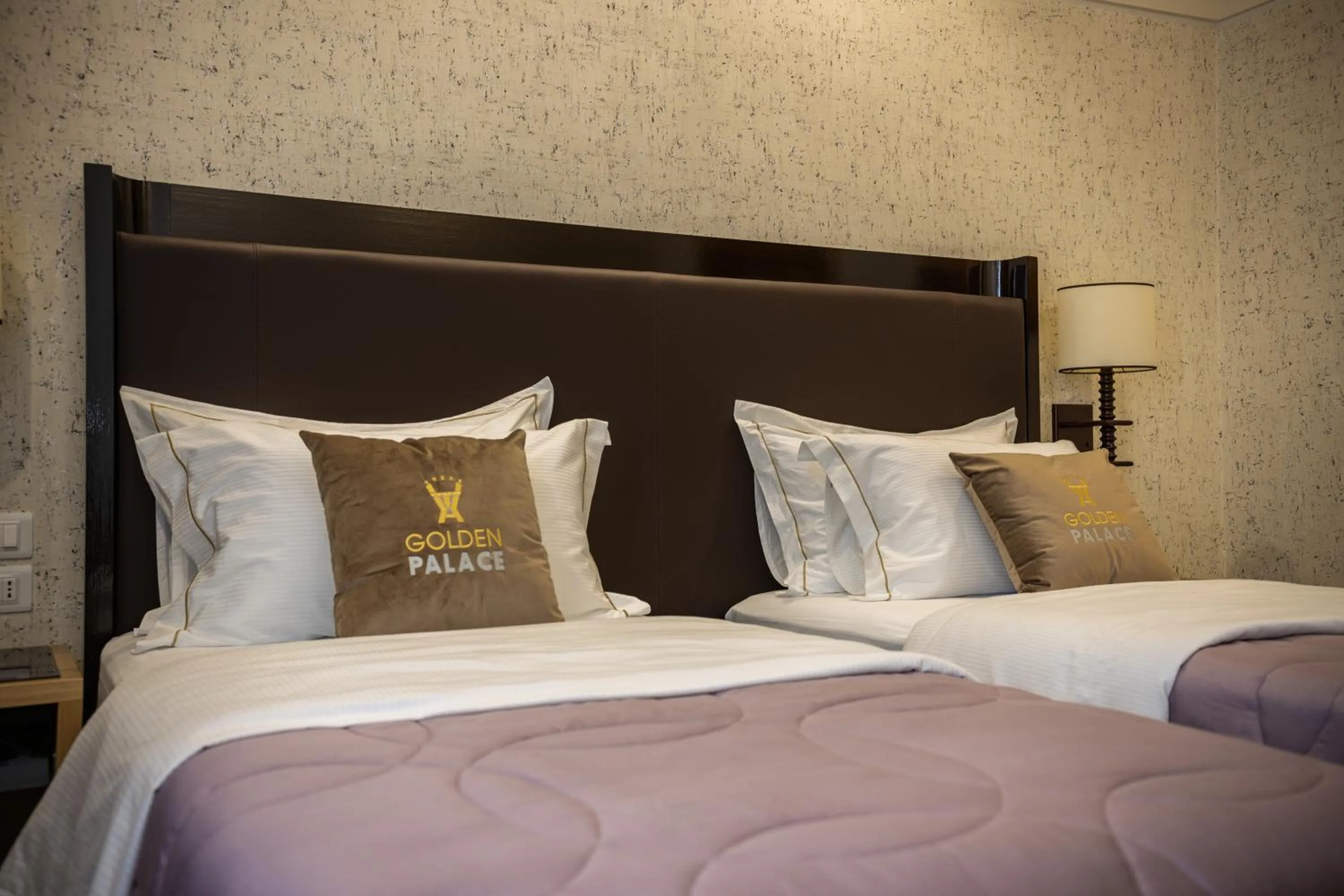 Bed in Hotel Golden Palace