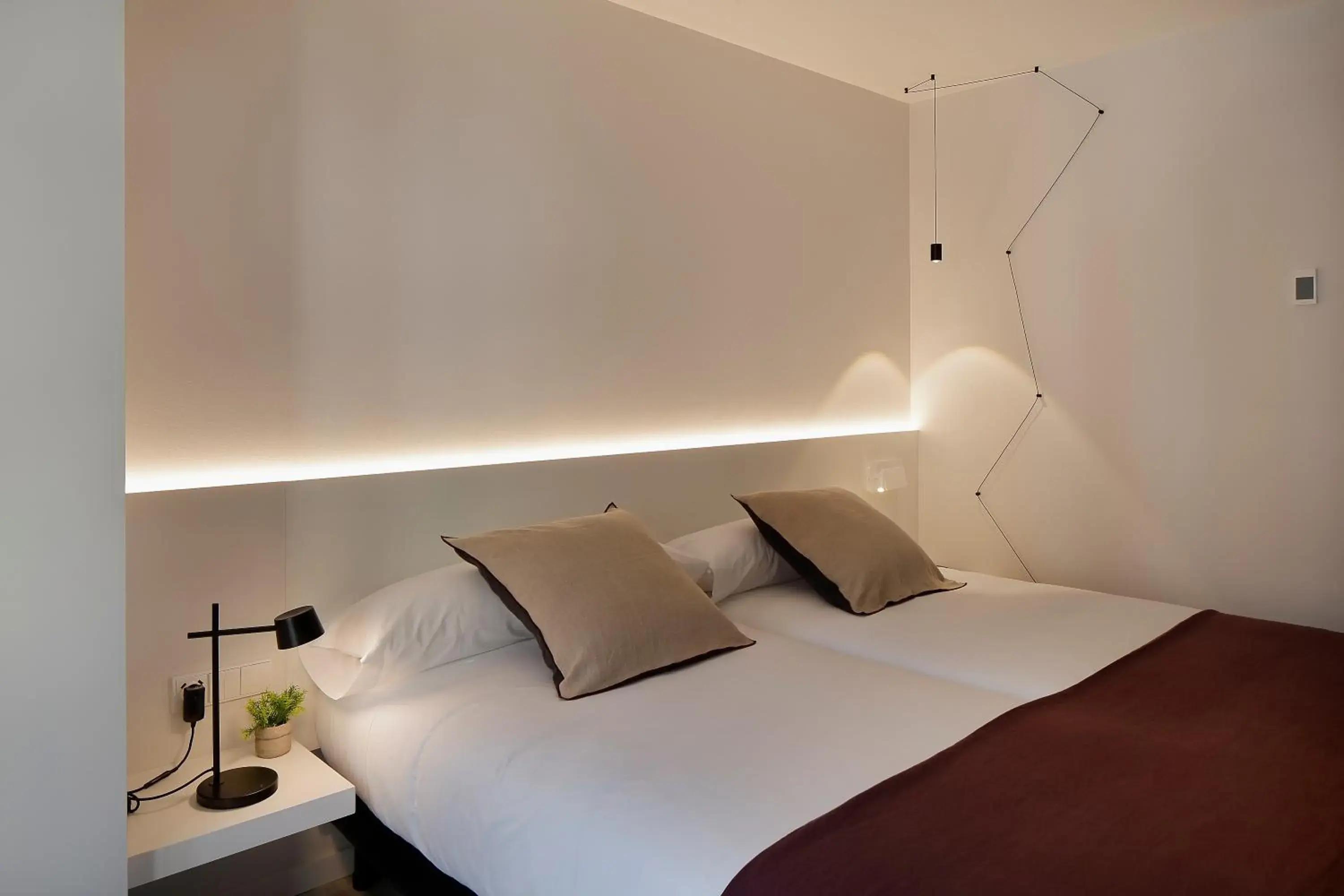 Decorative detail, Bed in Munna Hotel Boutique Decorative detail, Bed in Munna Hotel Boutique