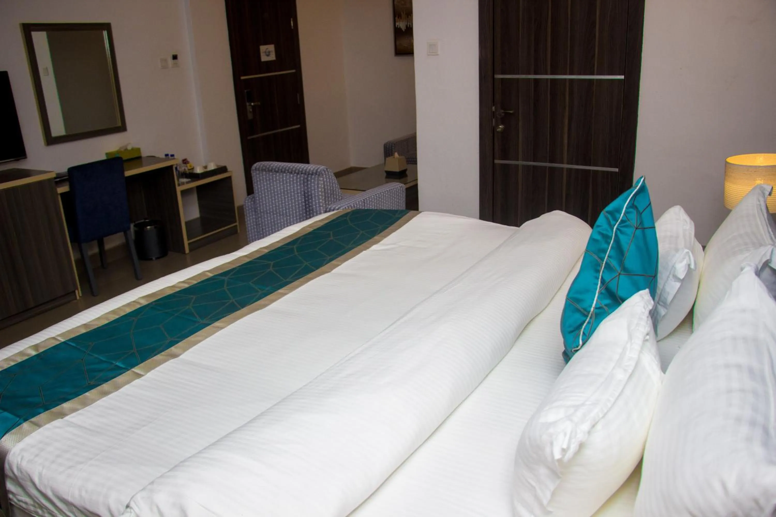 Bed in Riviera Suites