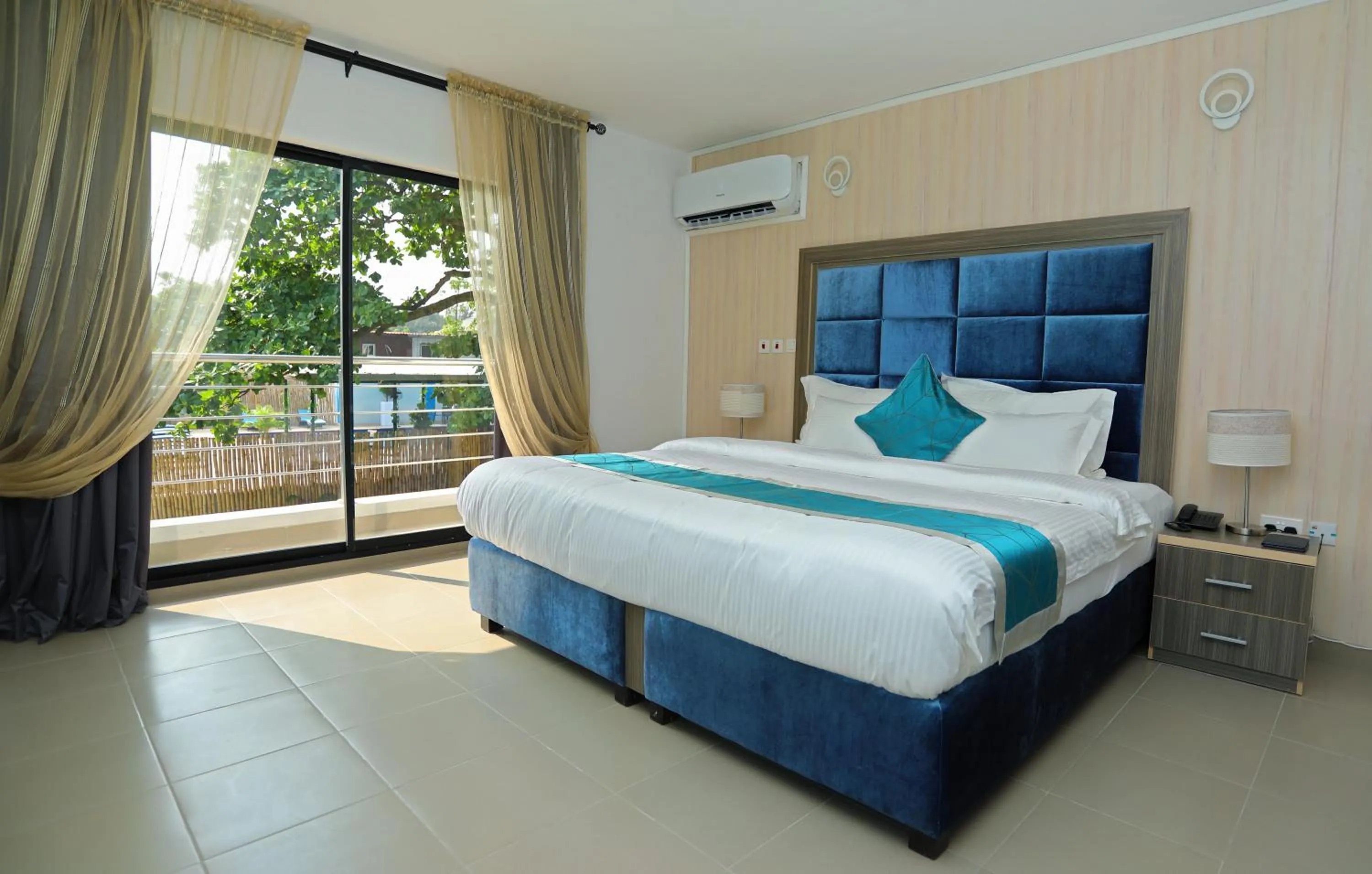 Bed in Riviera Suites