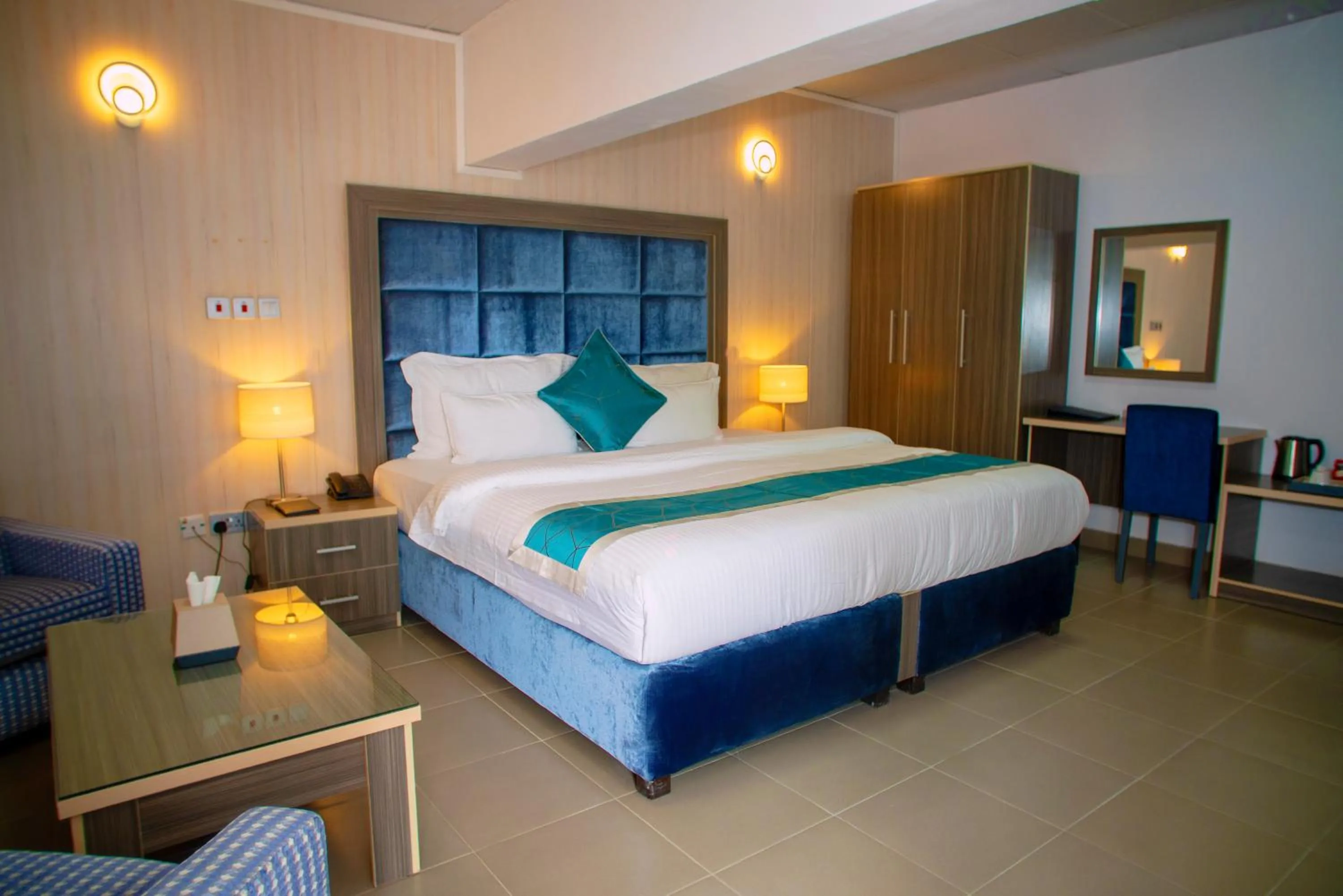 Bed in Riviera Suites