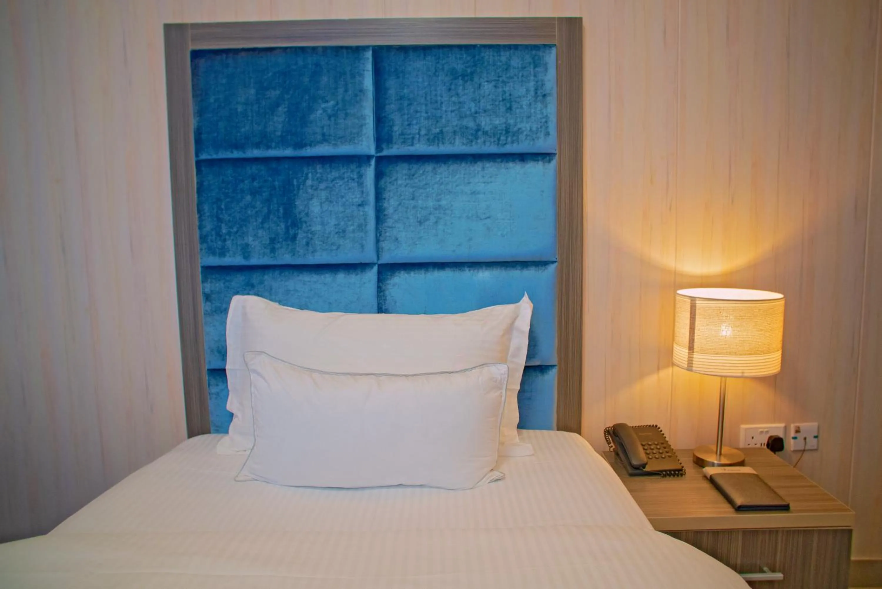 Bed in Riviera Suites