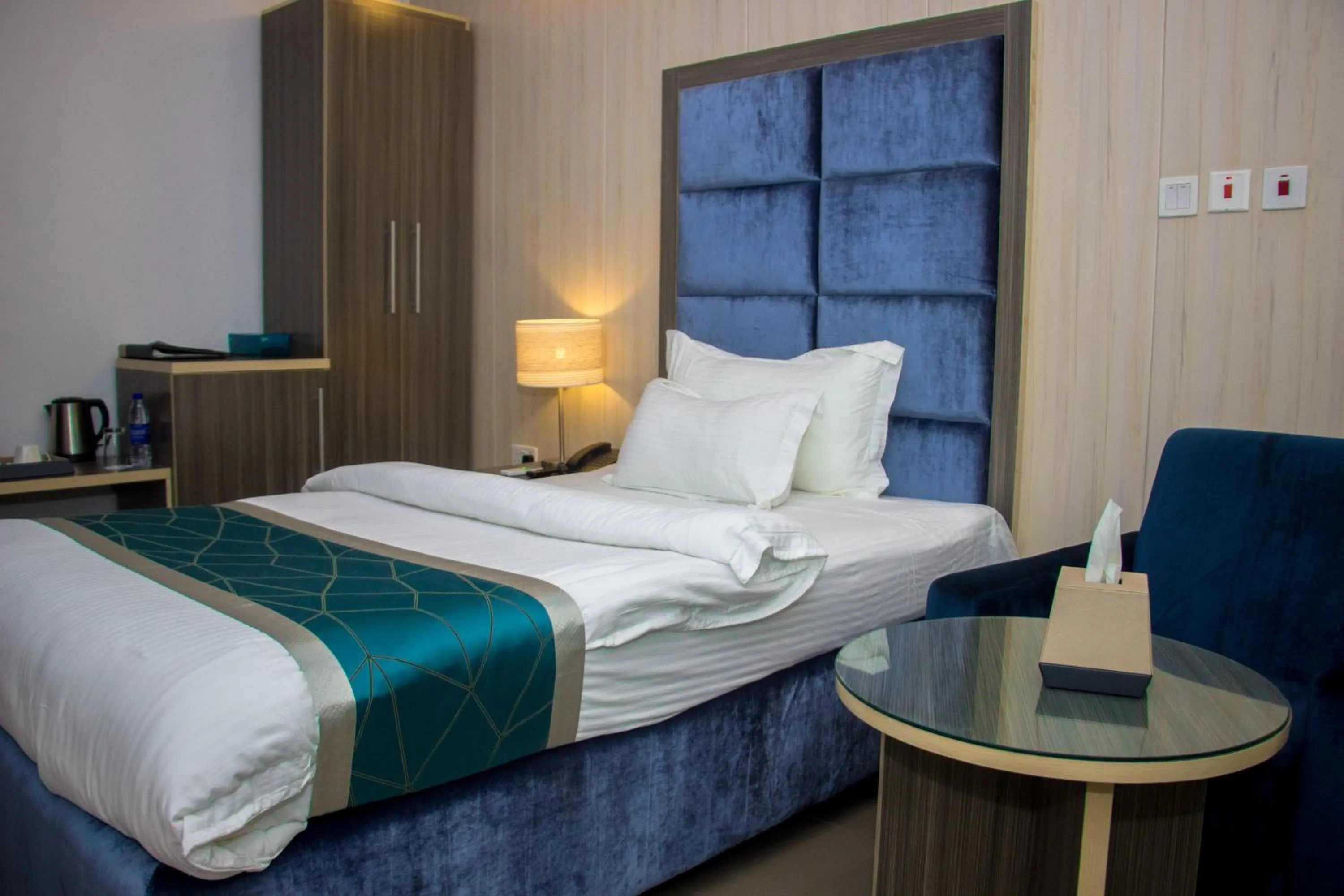 Bed in Riviera Suites