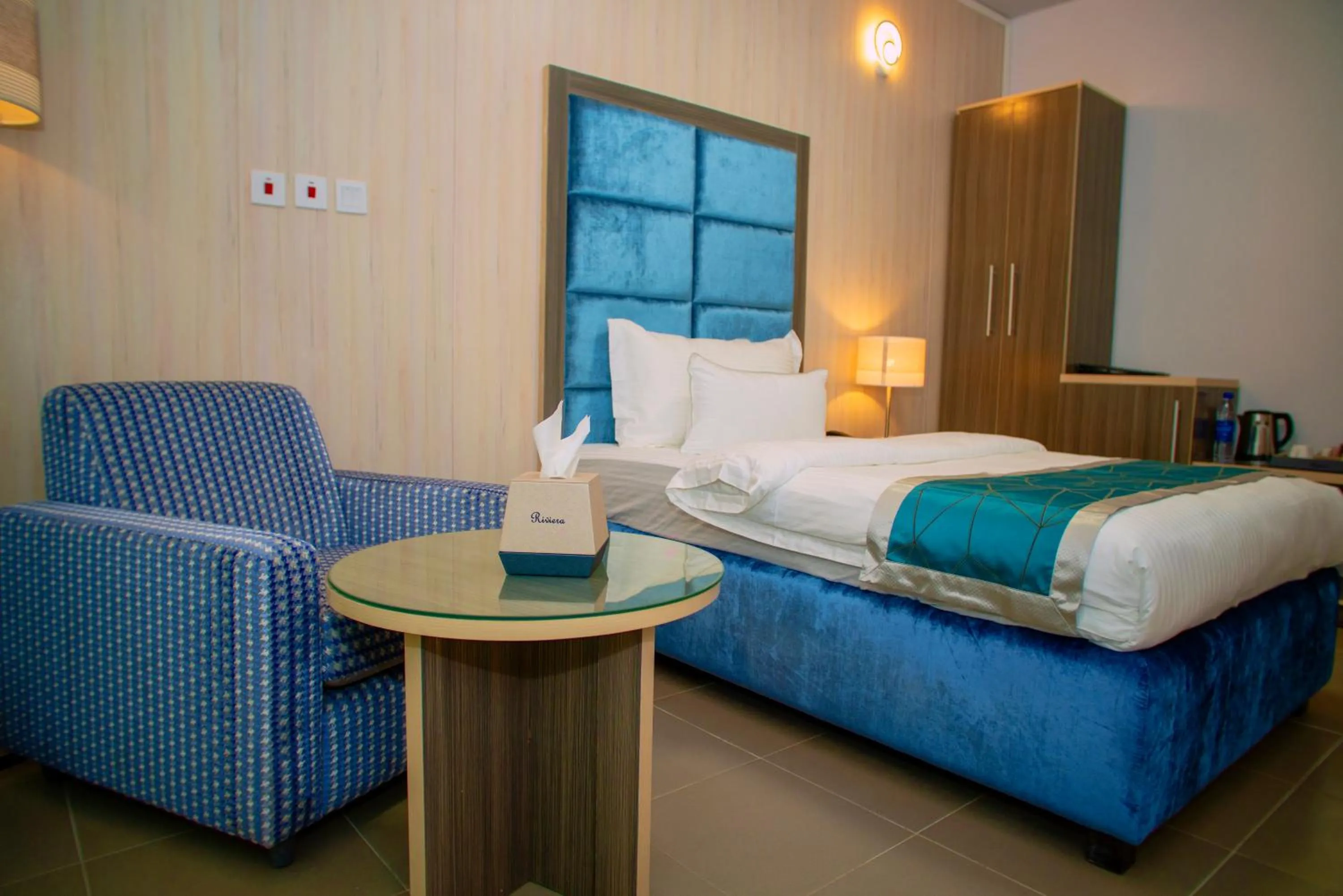 Bed in Riviera Suites