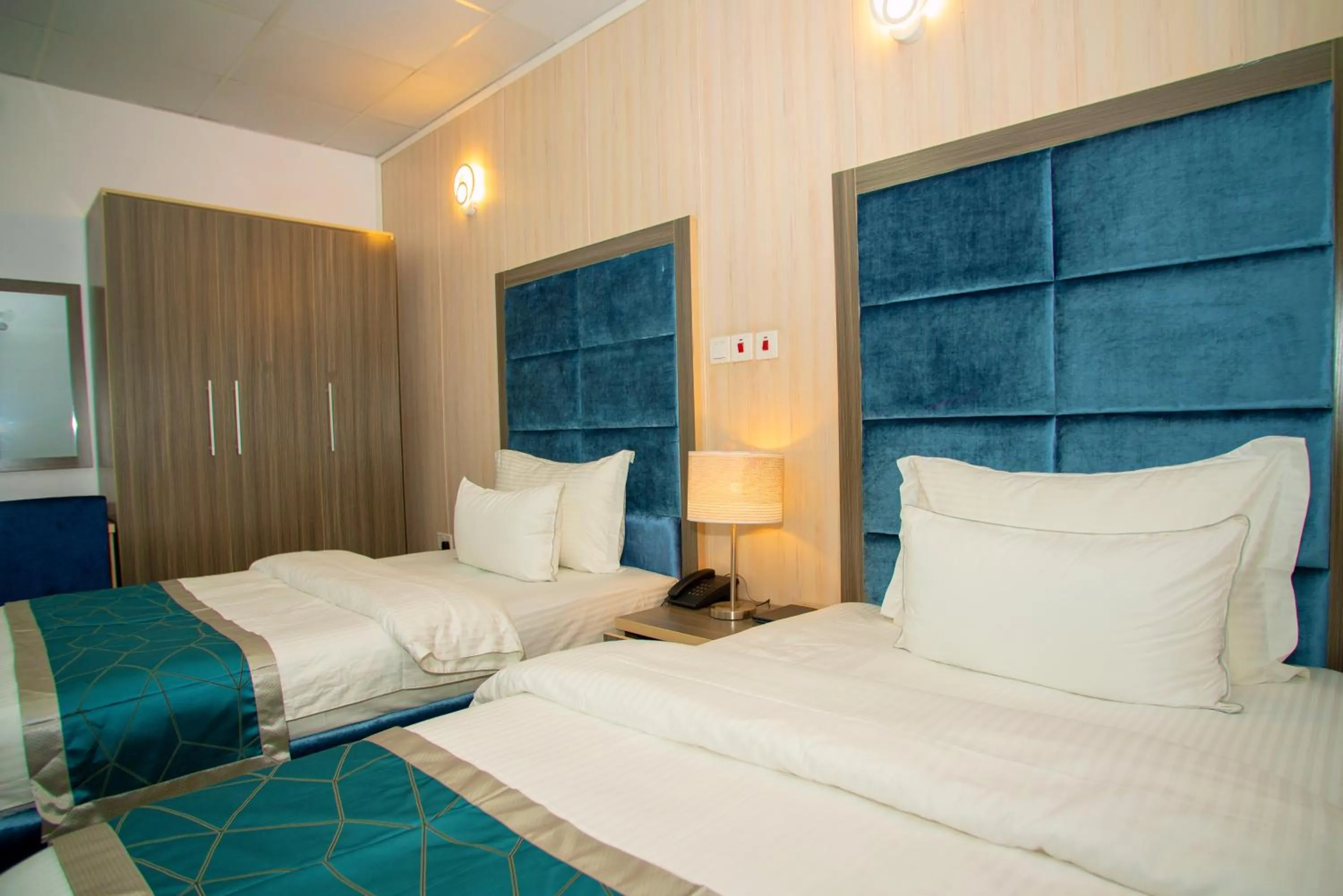 Bed in Riviera Suites