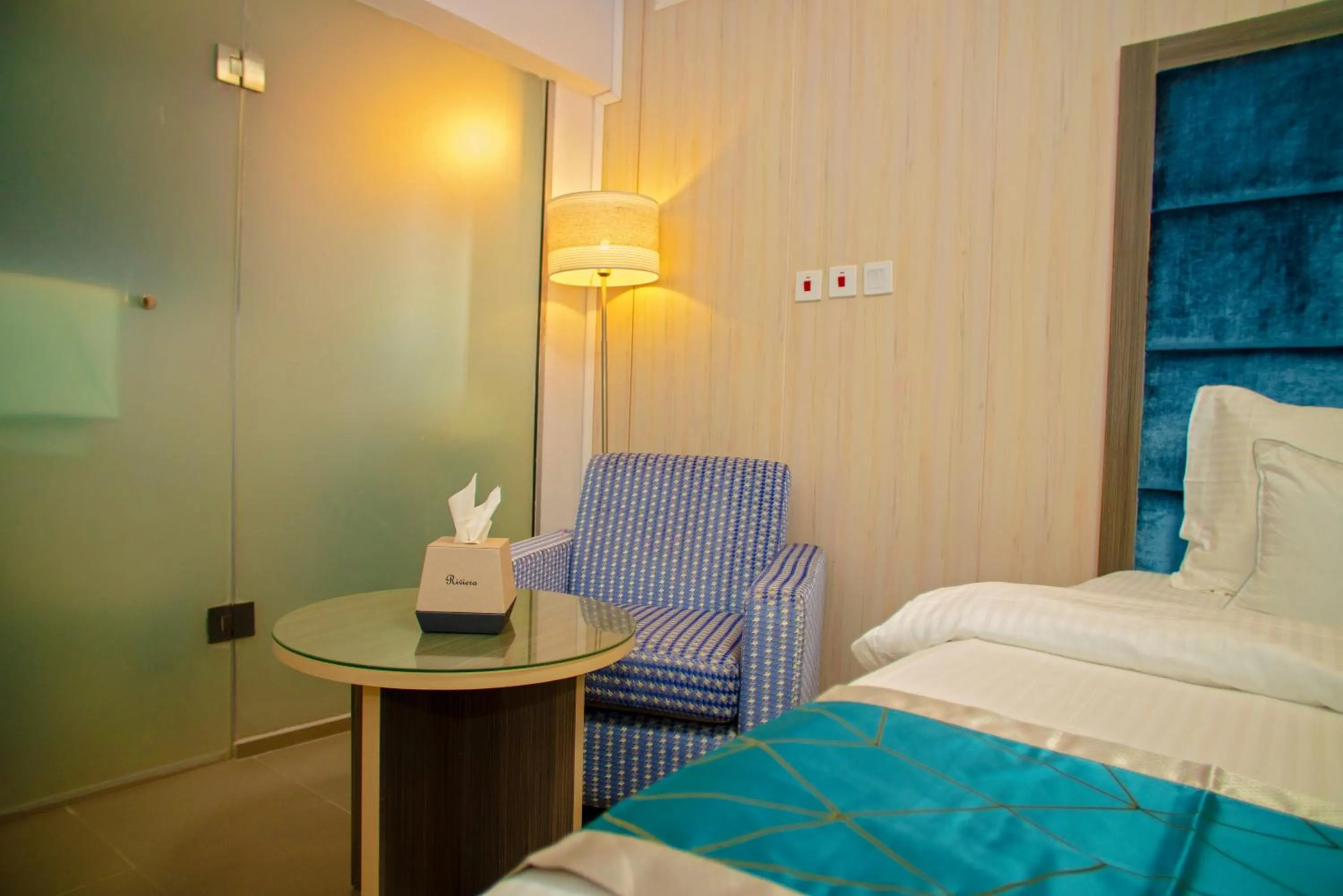 Bed in Riviera Suites