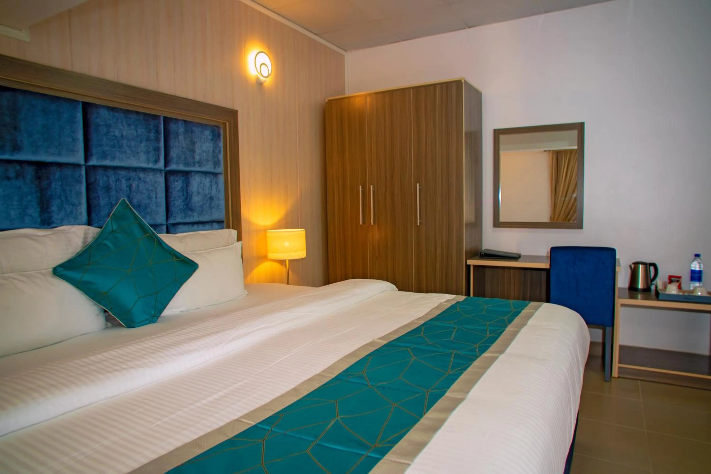 Bed in Riviera Suites