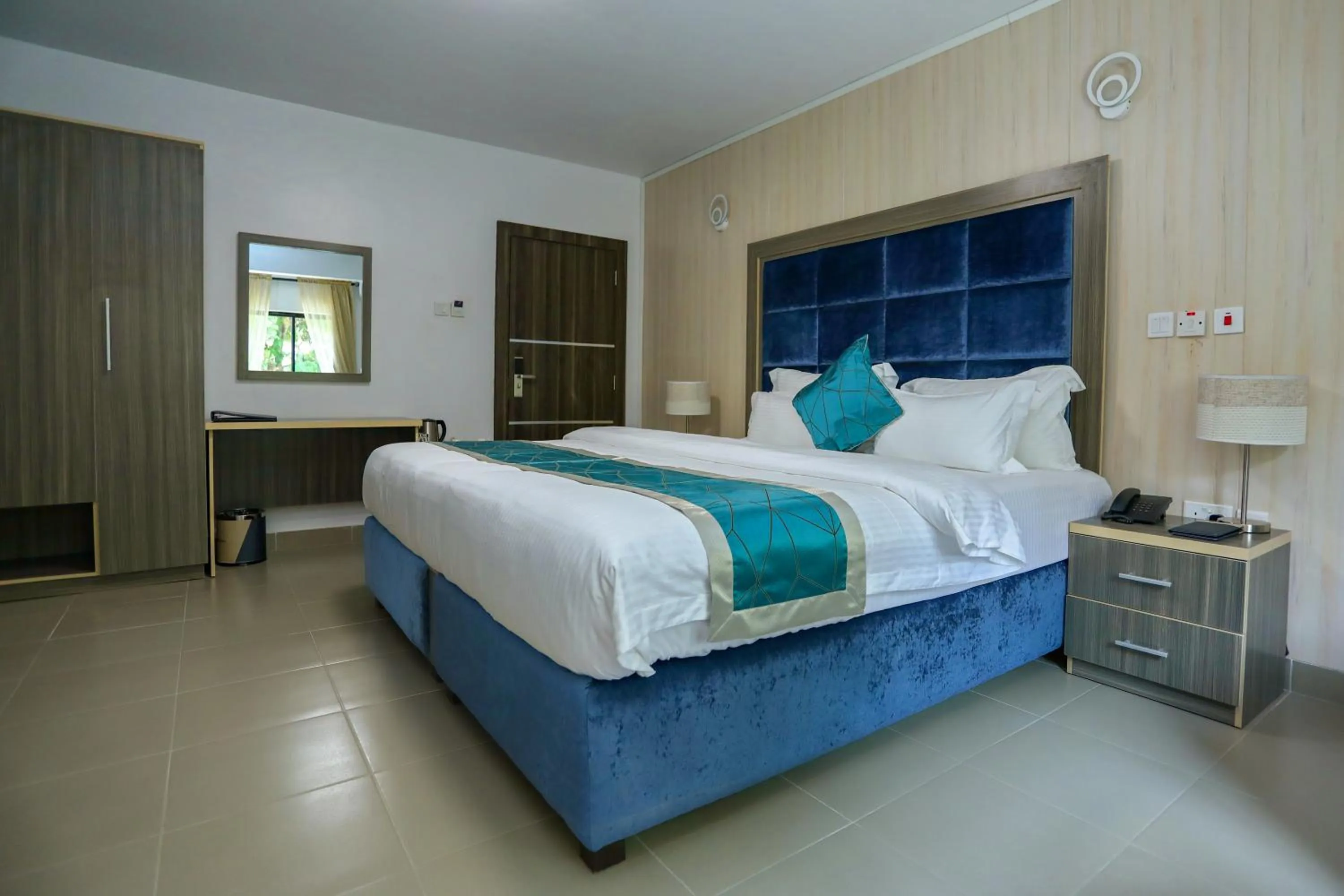 Photo of the whole room, Bed in Riviera Suites