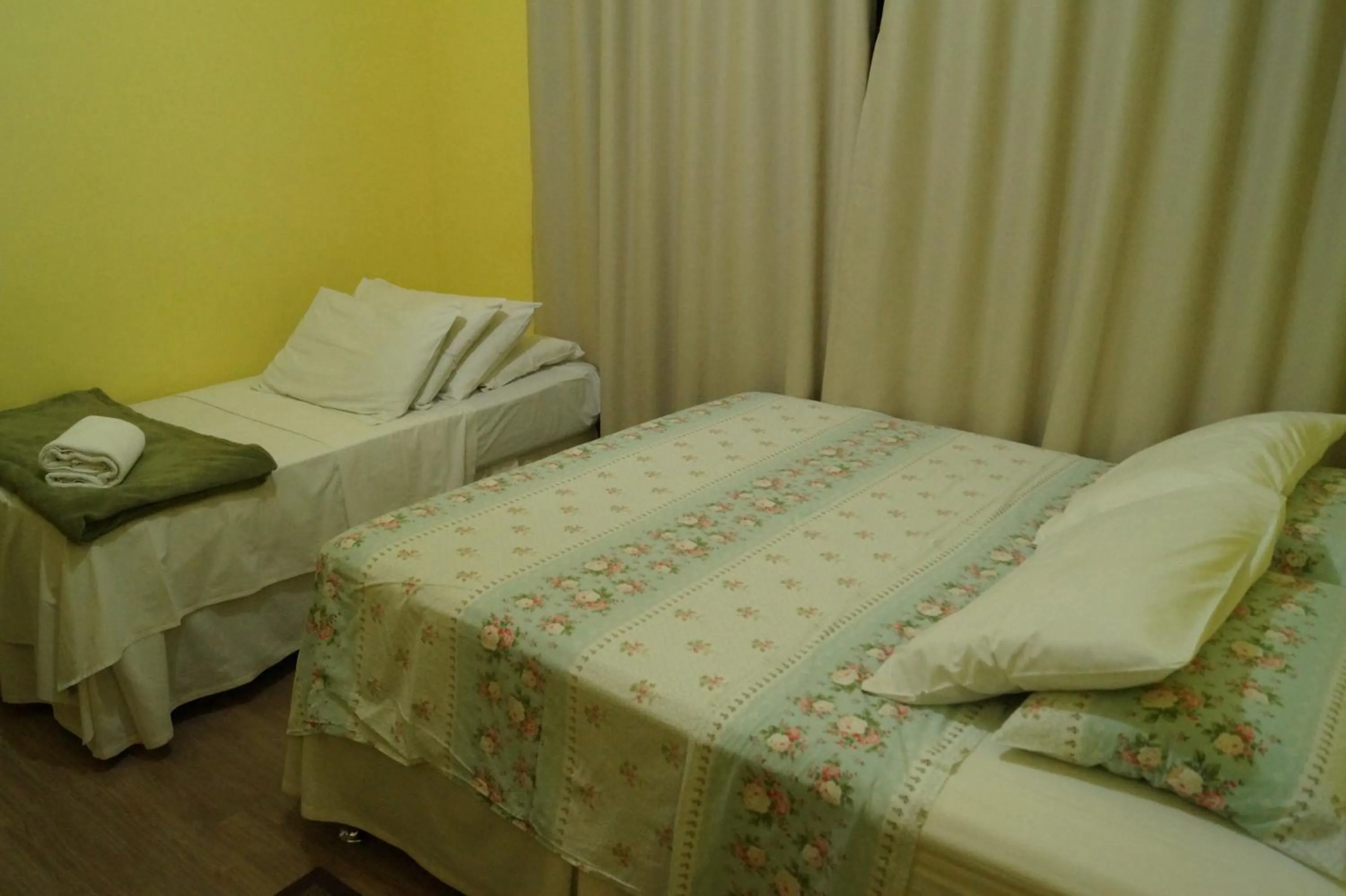 Bed in Ipê Rosa Hotel