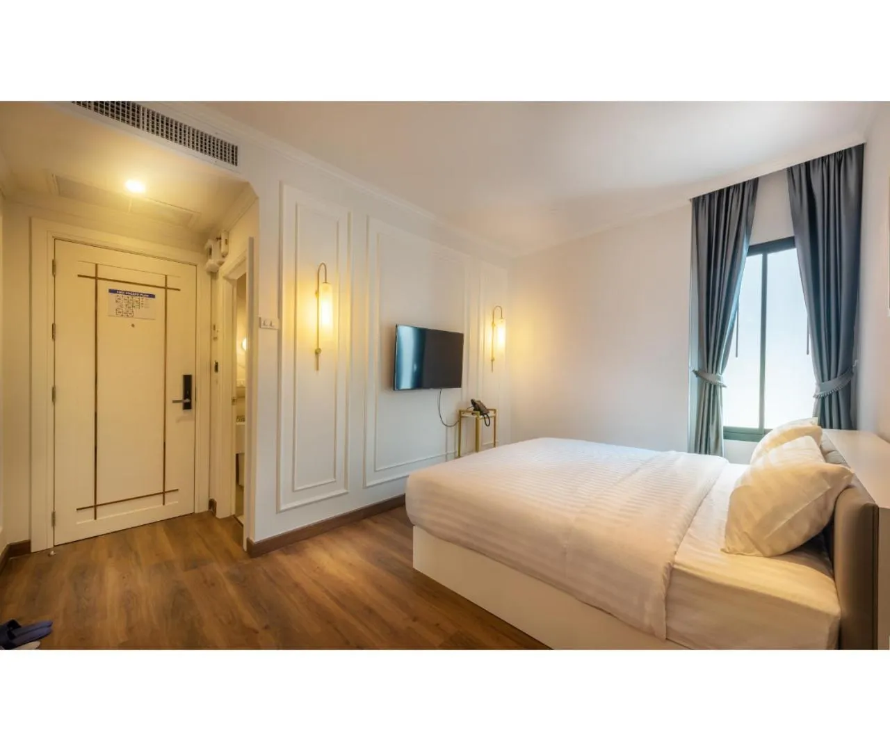 Bed in Nine River Hotel